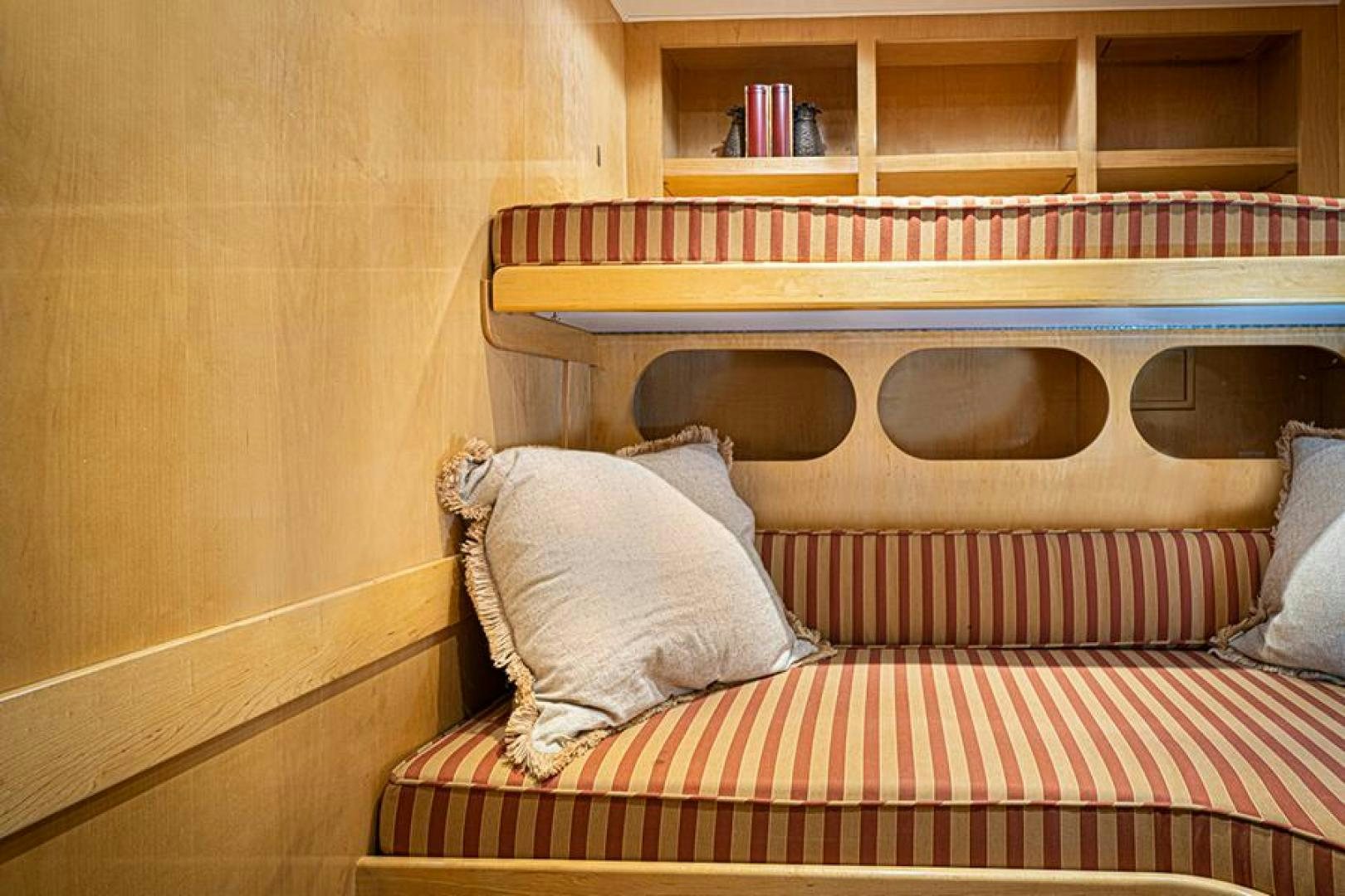 a dog sleeping on a couch aboard TUFF LIFE IV Yacht for Sale