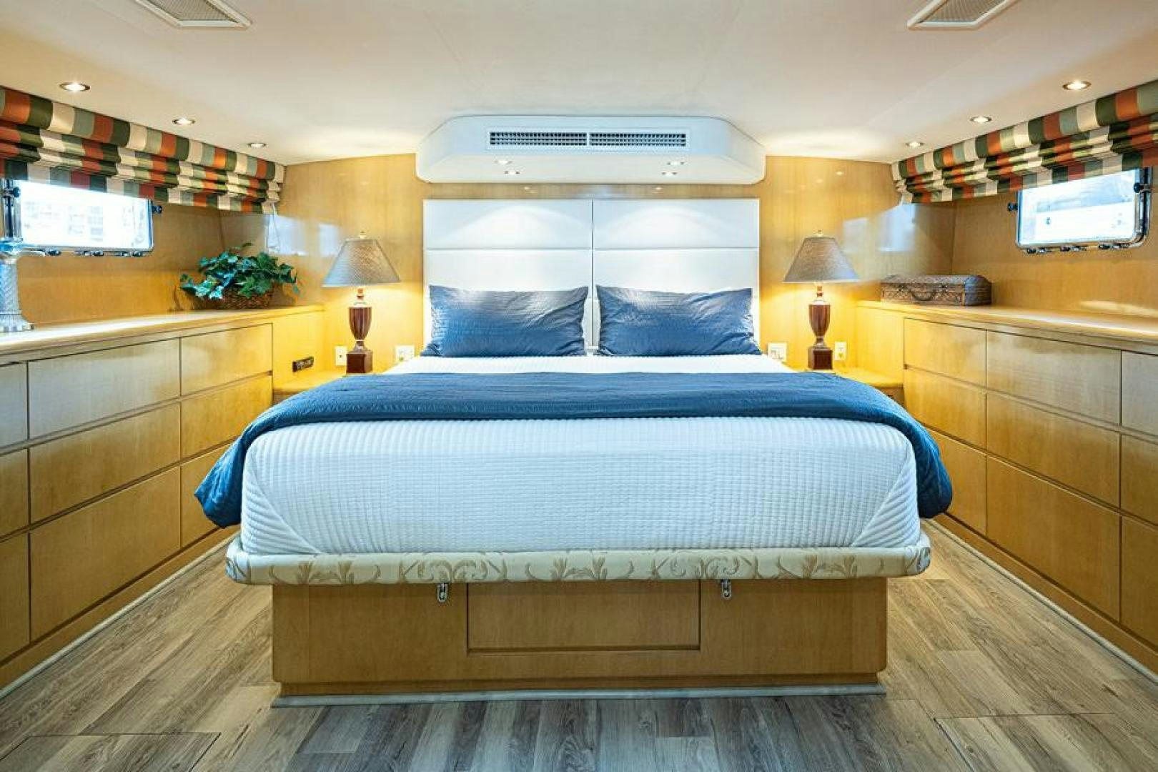 a bed in a room aboard TUFF LIFE IV Yacht for Sale