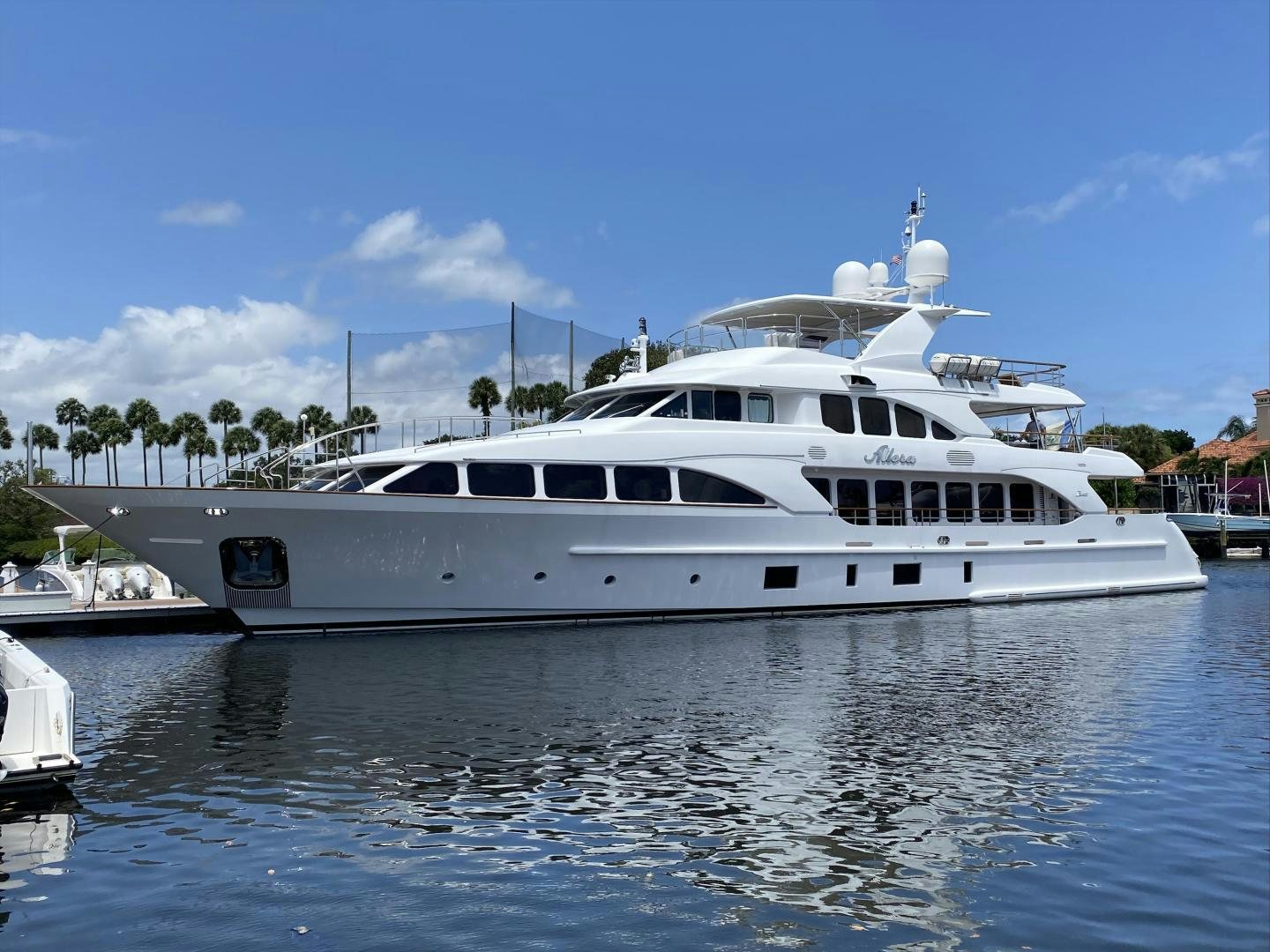 a white yacht in the water aboard ALLORA Yacht for Sale