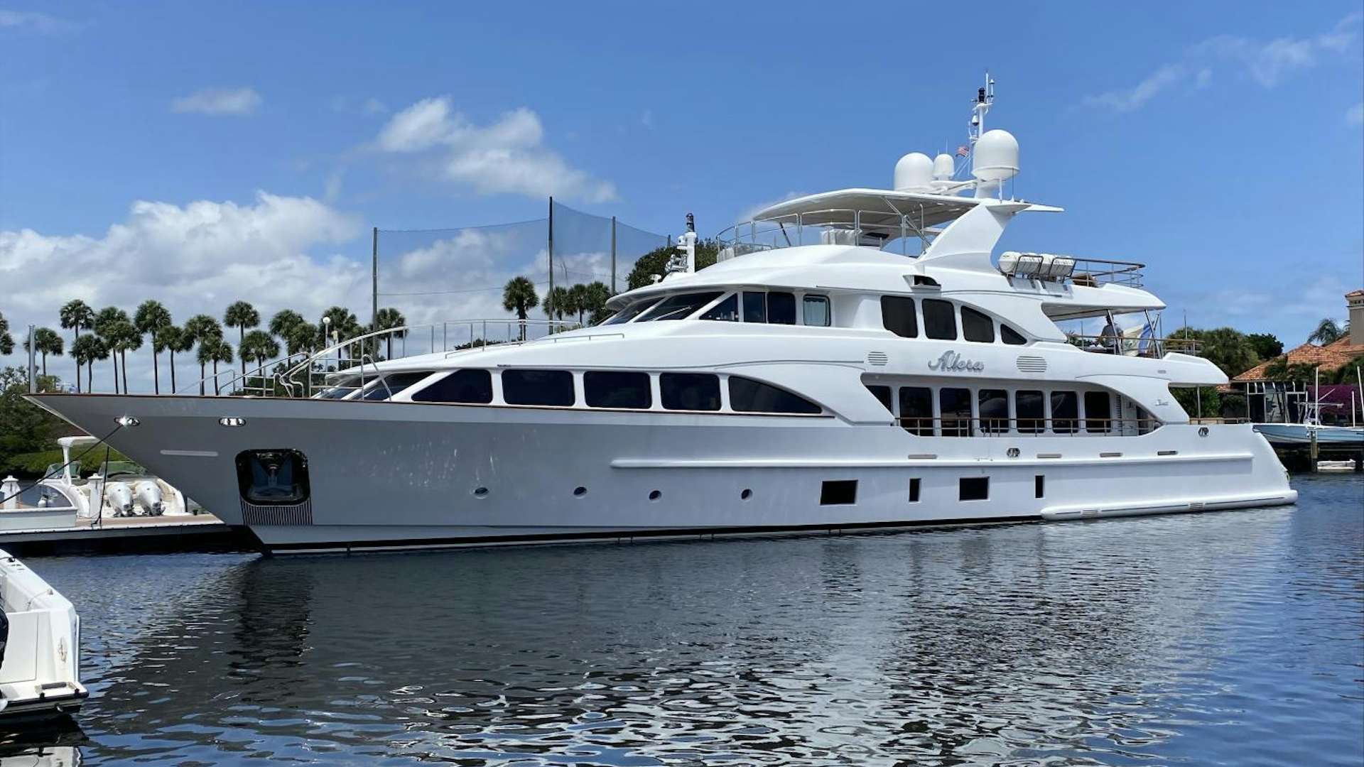 a white yacht in the water aboard ALLORA Yacht for Sale