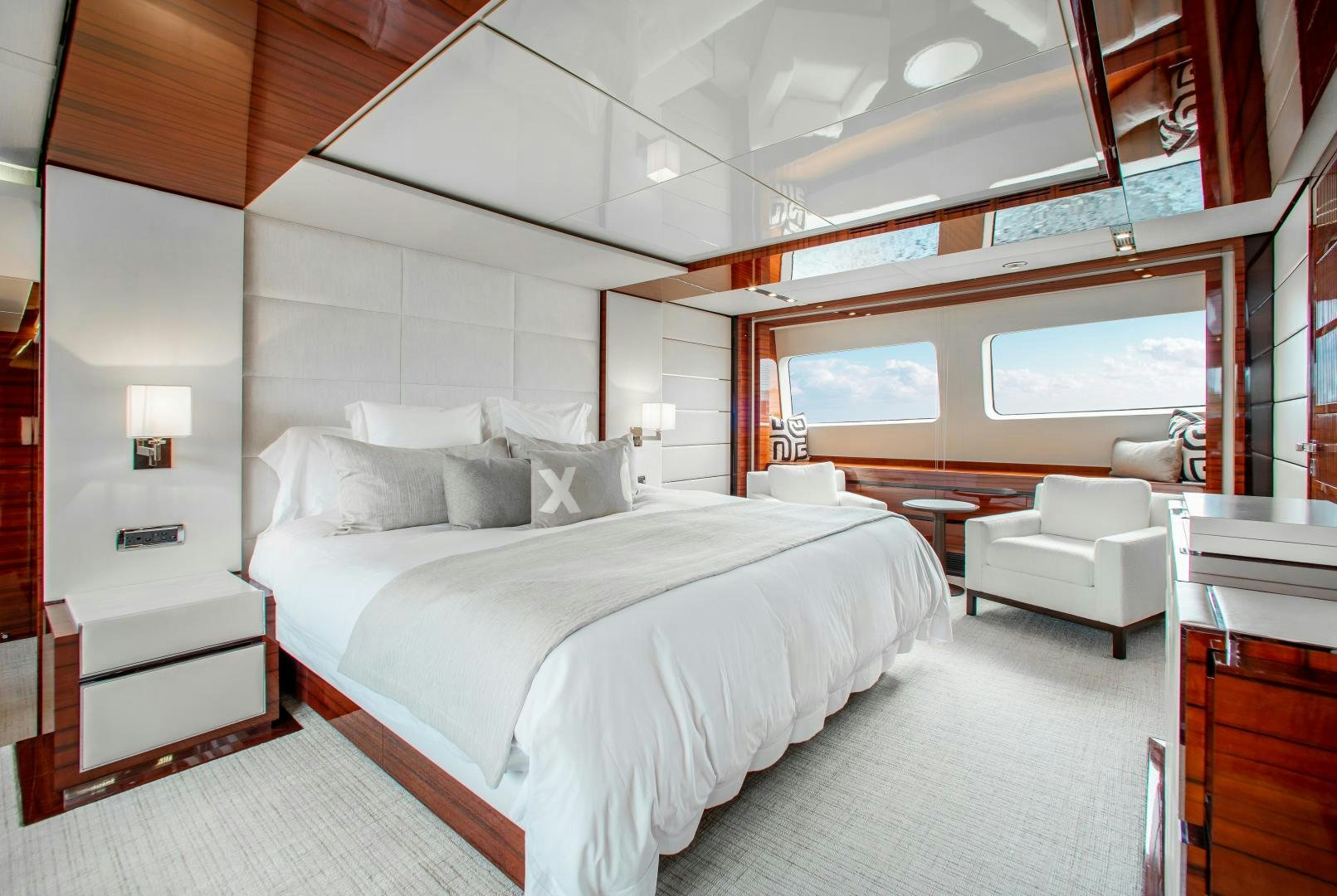 a large bedroom with a large bed aboard ALLORA Yacht for Sale