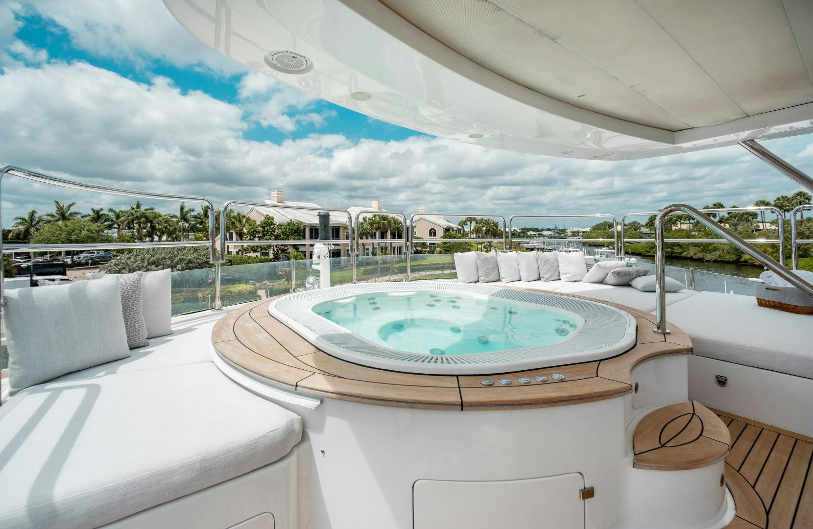 a large jacuzzi in a room with a large window aboard ALLORA Yacht for Sale