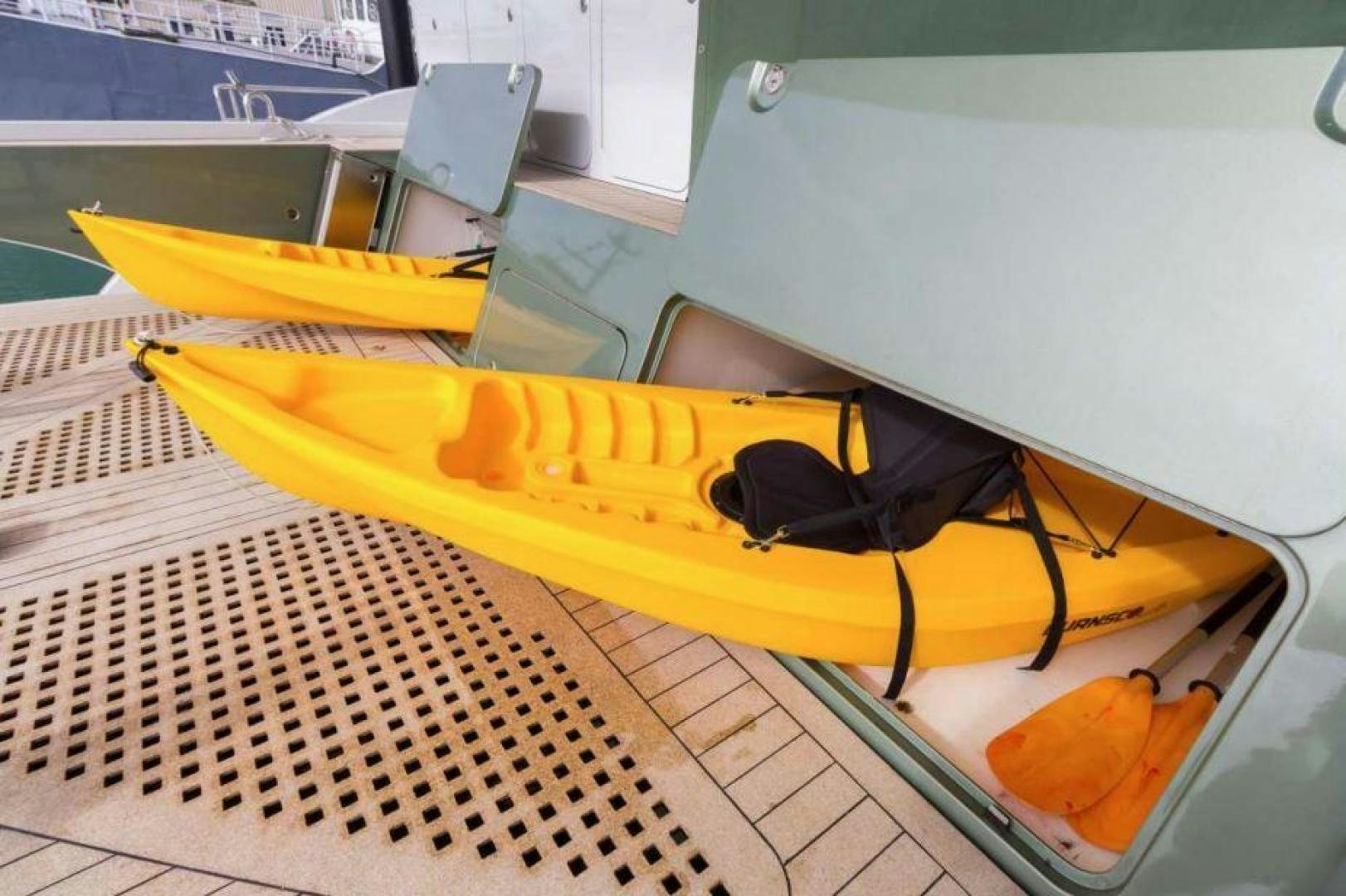 a yellow and black kayak aboard SAMARA Yacht for Sale