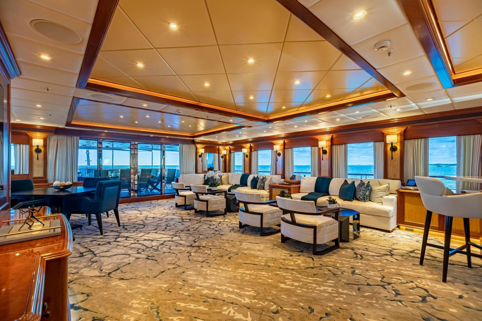 a large living room with a large open floor plan aboard UNBRIDLED Yacht for Sale
