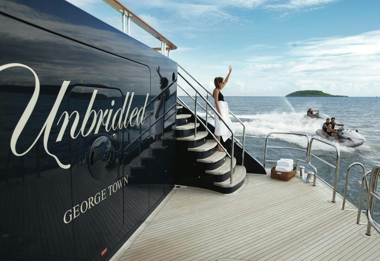 a boat with people on it aboard UNBRIDLED Yacht for Sale