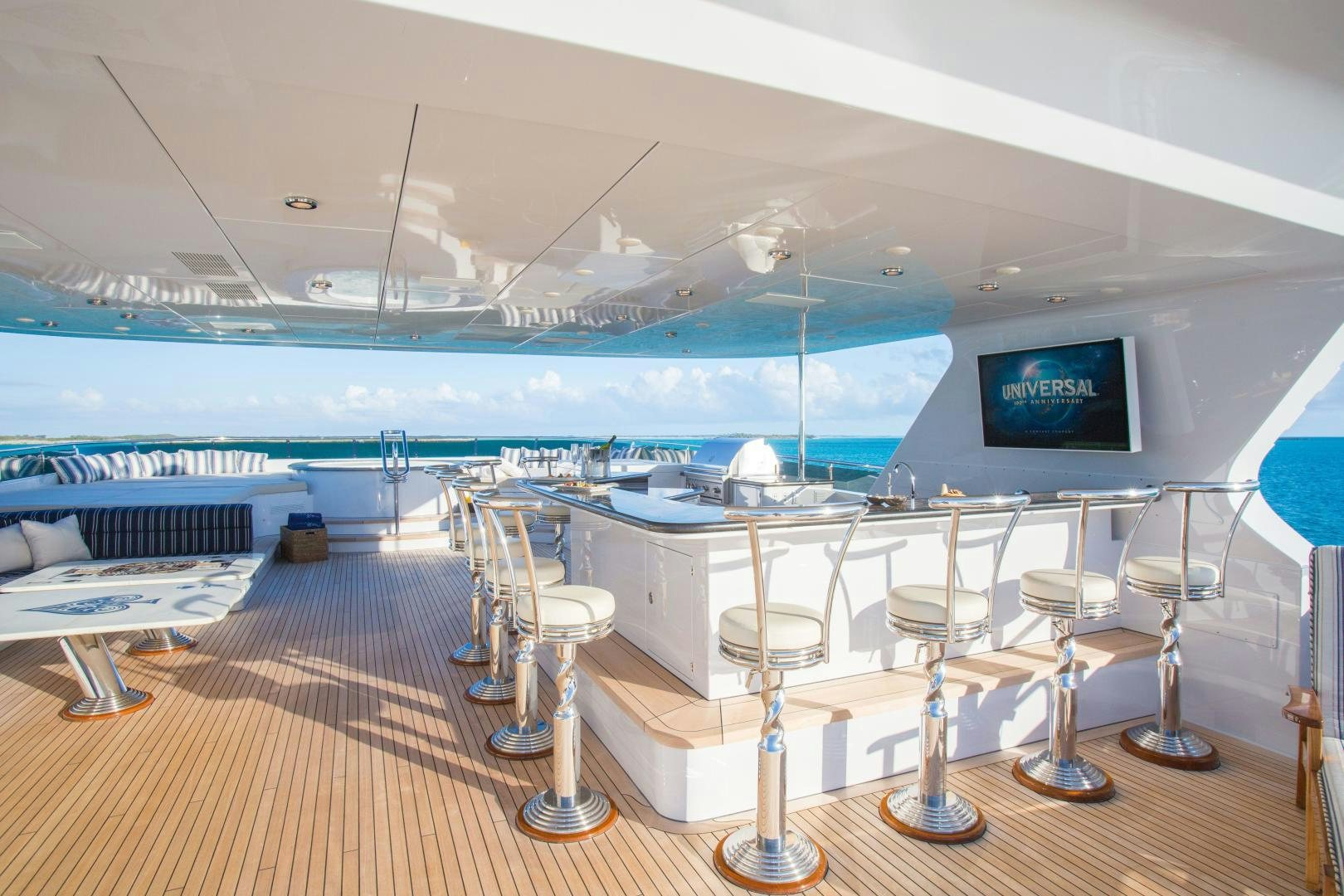 a room with a large window and a view of the water aboard CASINO ROYALE Yacht for Sale