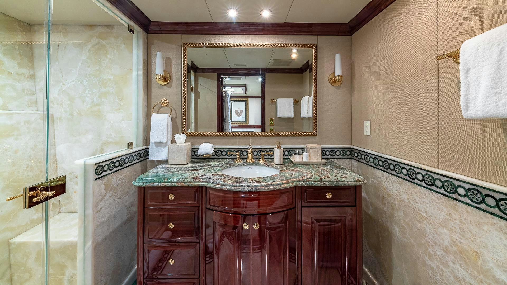 a bathroom with a marble counter top aboard CASINO ROYALE Yacht for Sale