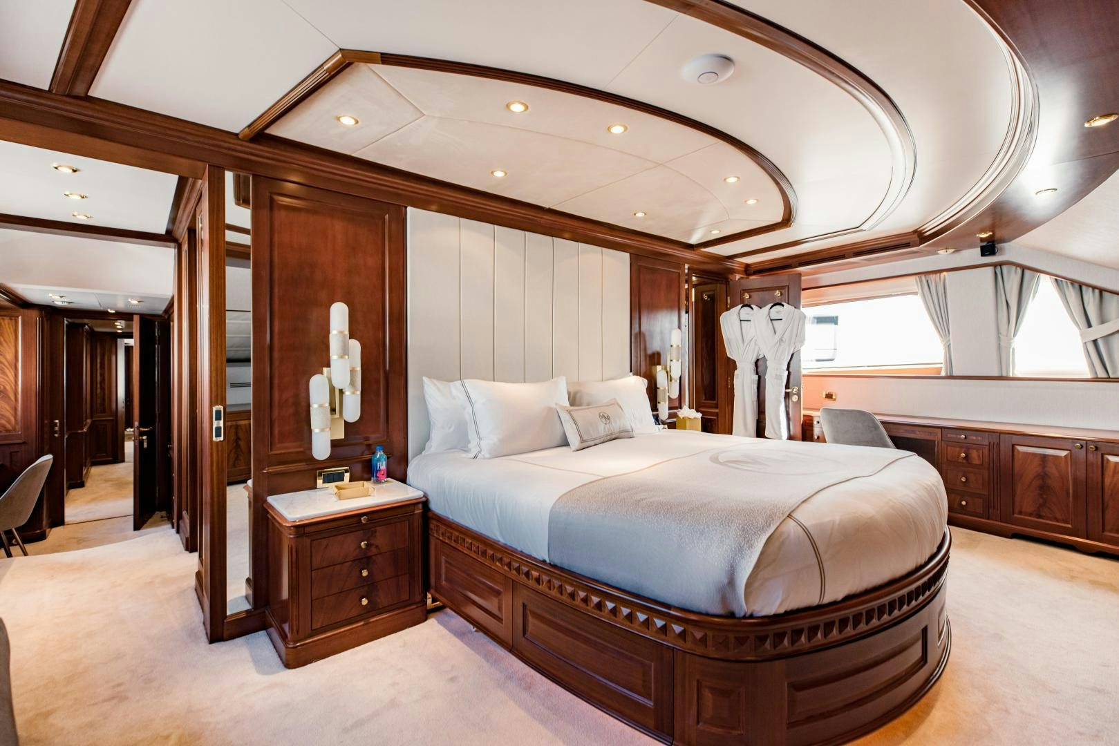 a large bedroom with a large bed aboard MAMMA MIA Yacht for Sale