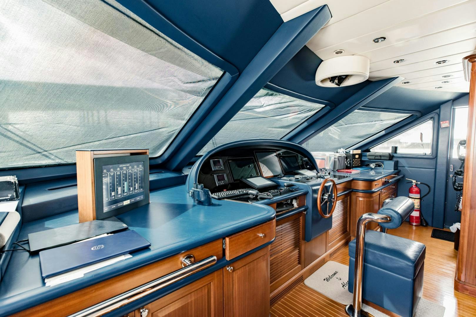 a car in a garage aboard MAMMA MIA Yacht for Sale