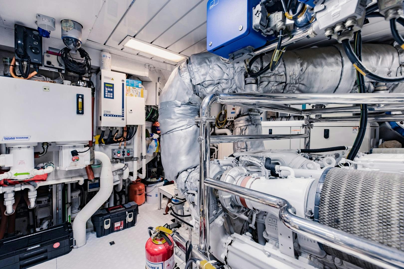a room with several machines aboard MAMMA MIA Yacht for Sale