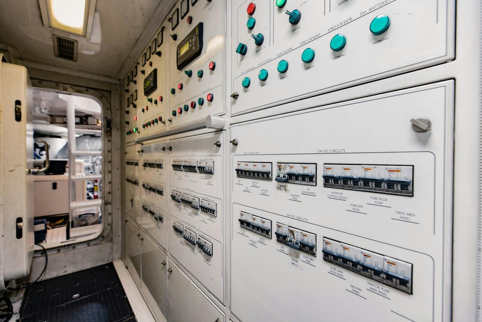 a white refrigerator with magnets aboard MAMMA MIA Yacht for Sale