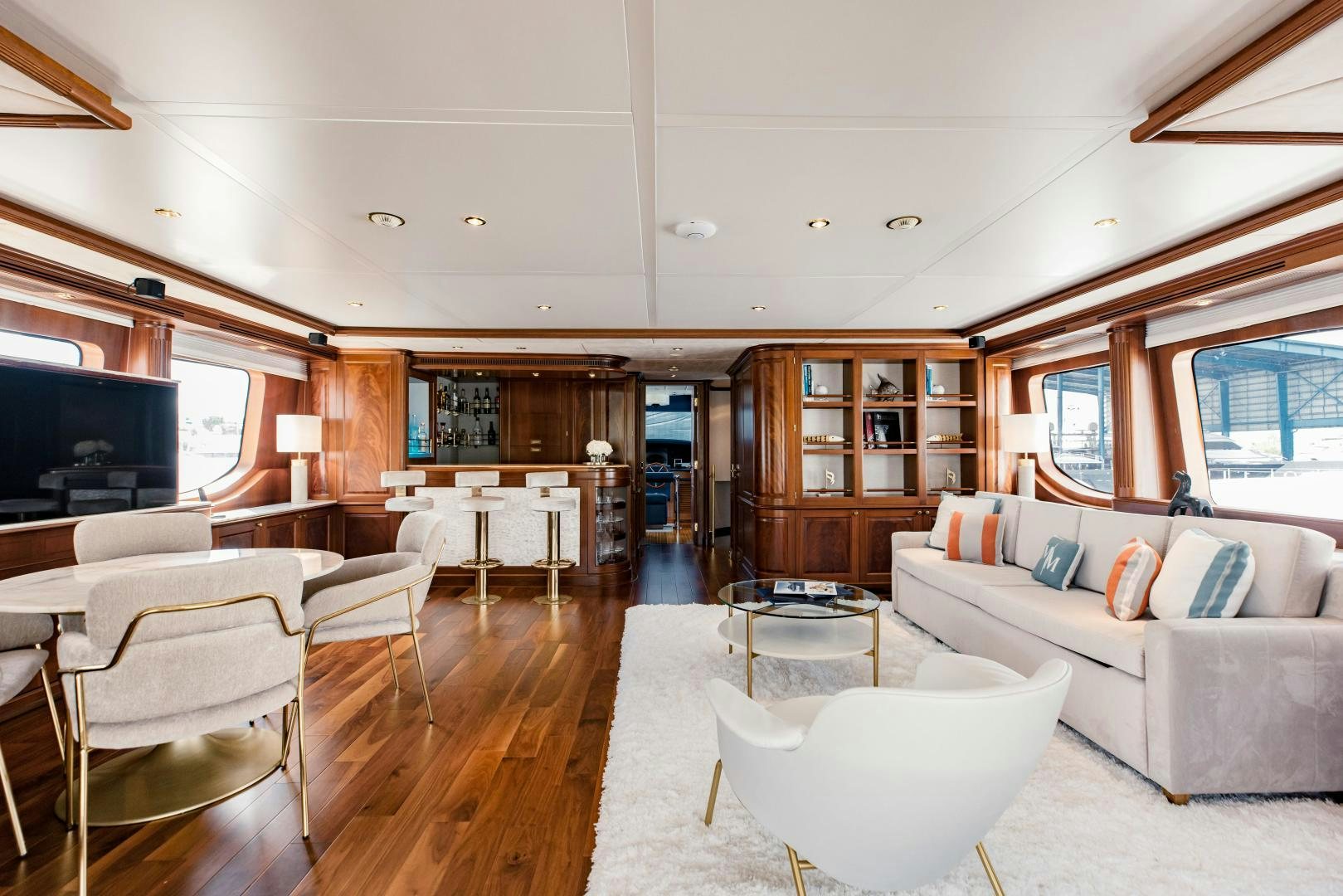 a living room with a large open floor plan aboard MAMMA MIA Yacht for Sale