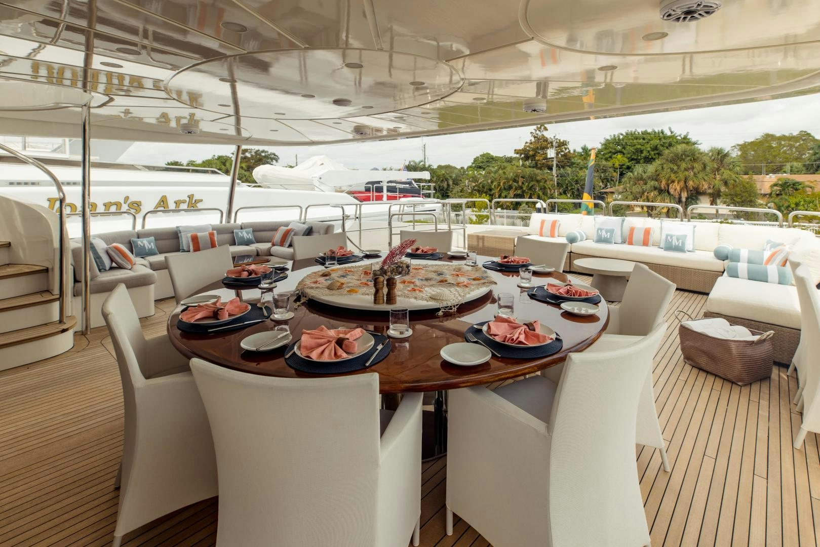 a table with plates and food on it aboard MAMMA MIA Yacht for Sale