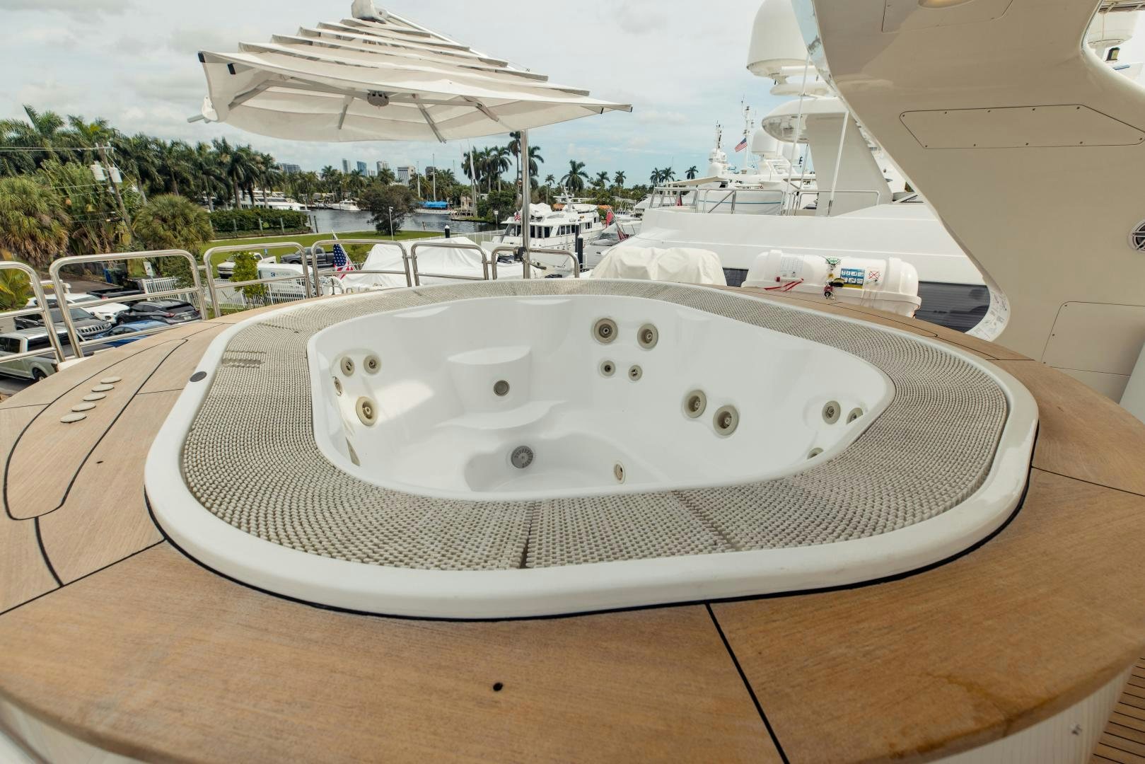 a large white boat on a wooden surface aboard MAMMA MIA Yacht for Sale