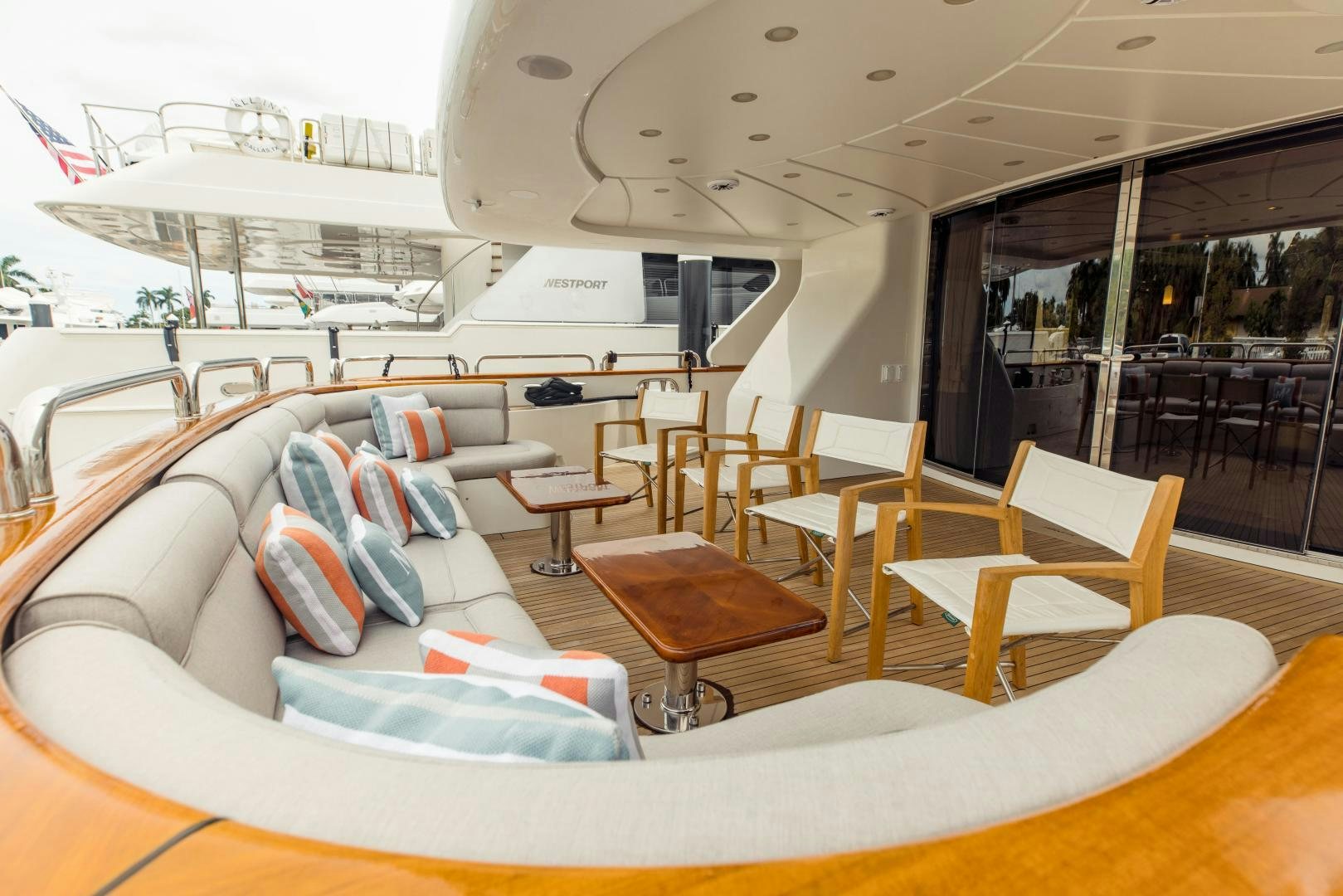a boat with a couch and chairs aboard MAMMA MIA Yacht for Sale