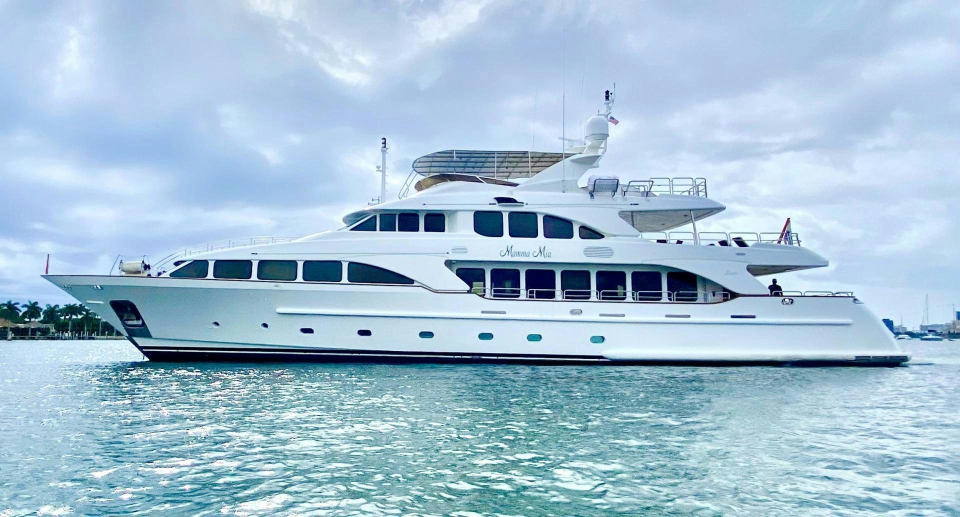 a white yacht in the water aboard MAMMA MIA Yacht for Sale