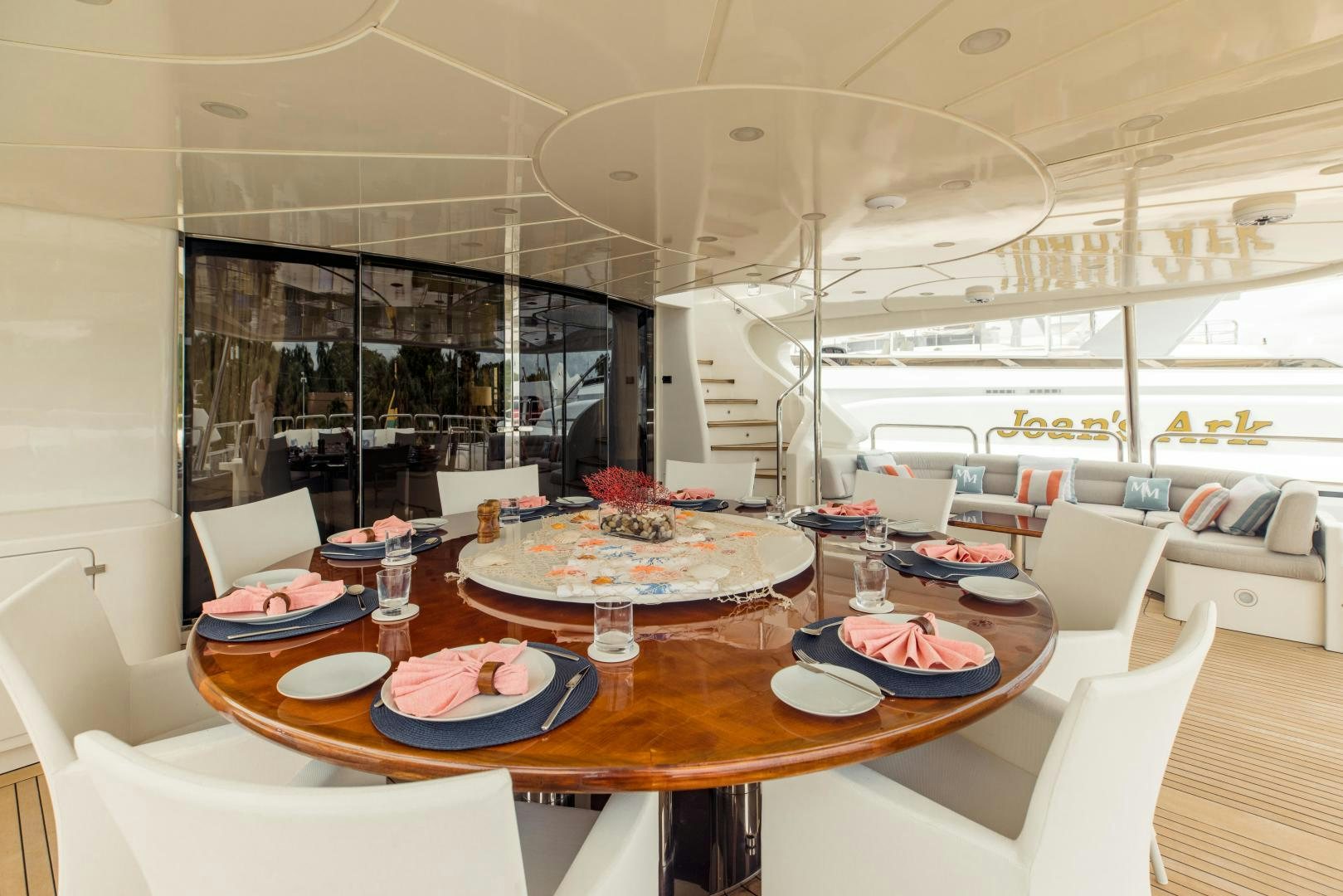 a large dining room with a large table and chairs aboard MAMMA MIA Yacht for Sale