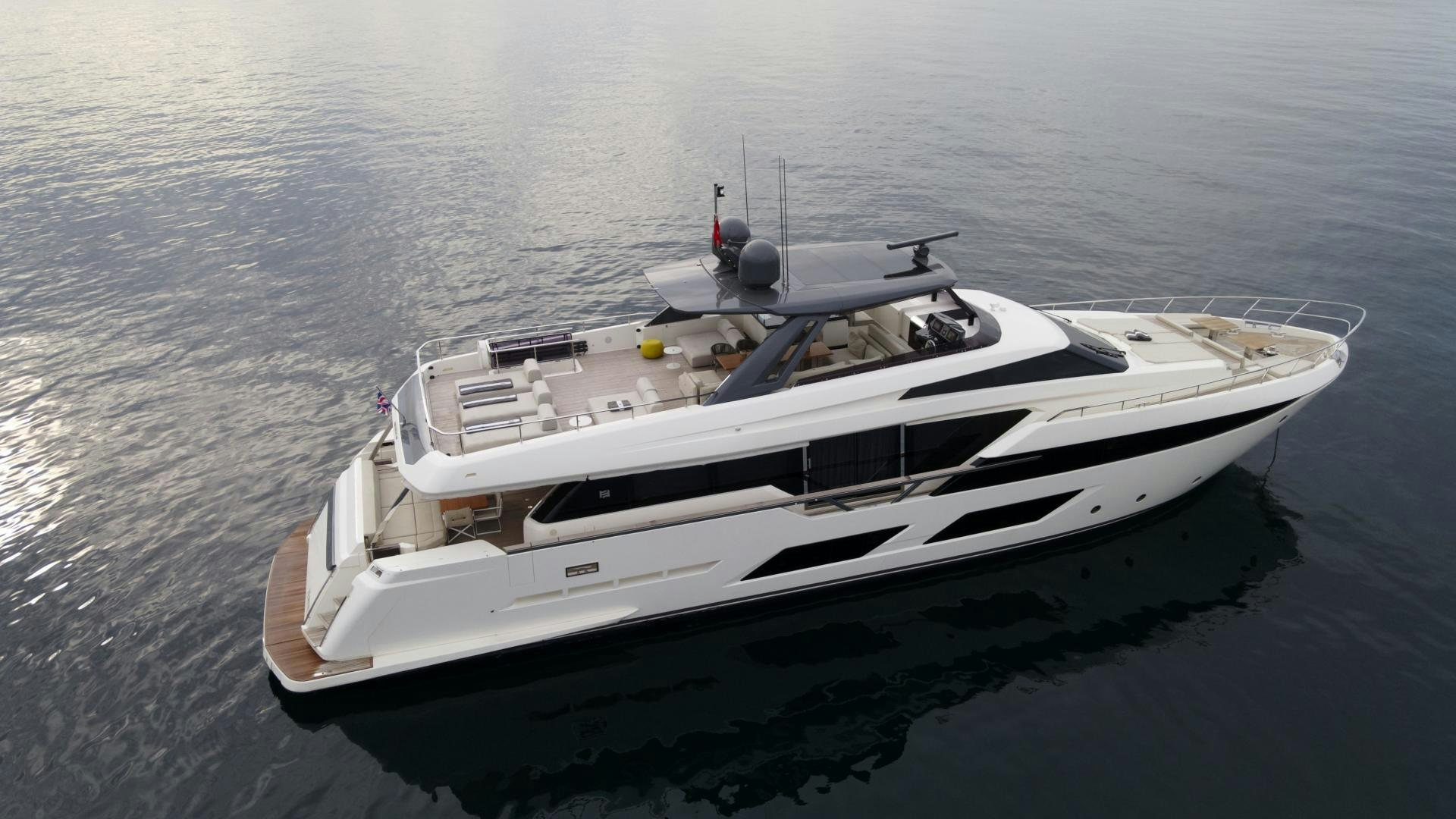 a white boat in the water aboard M/Y SUNRISE Yacht for Sale