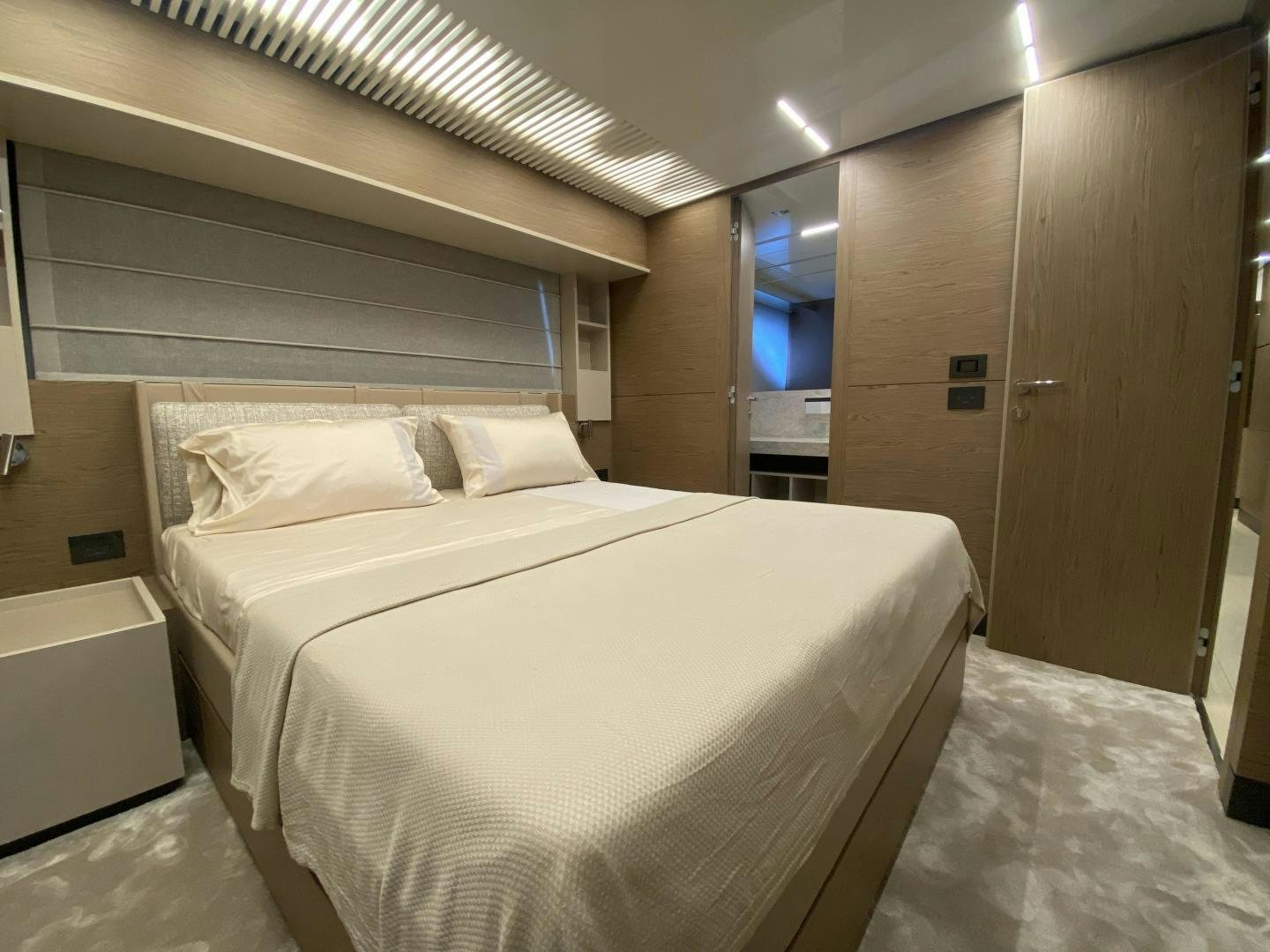 a bed in a room aboard M/Y SUNRISE Yacht for Sale