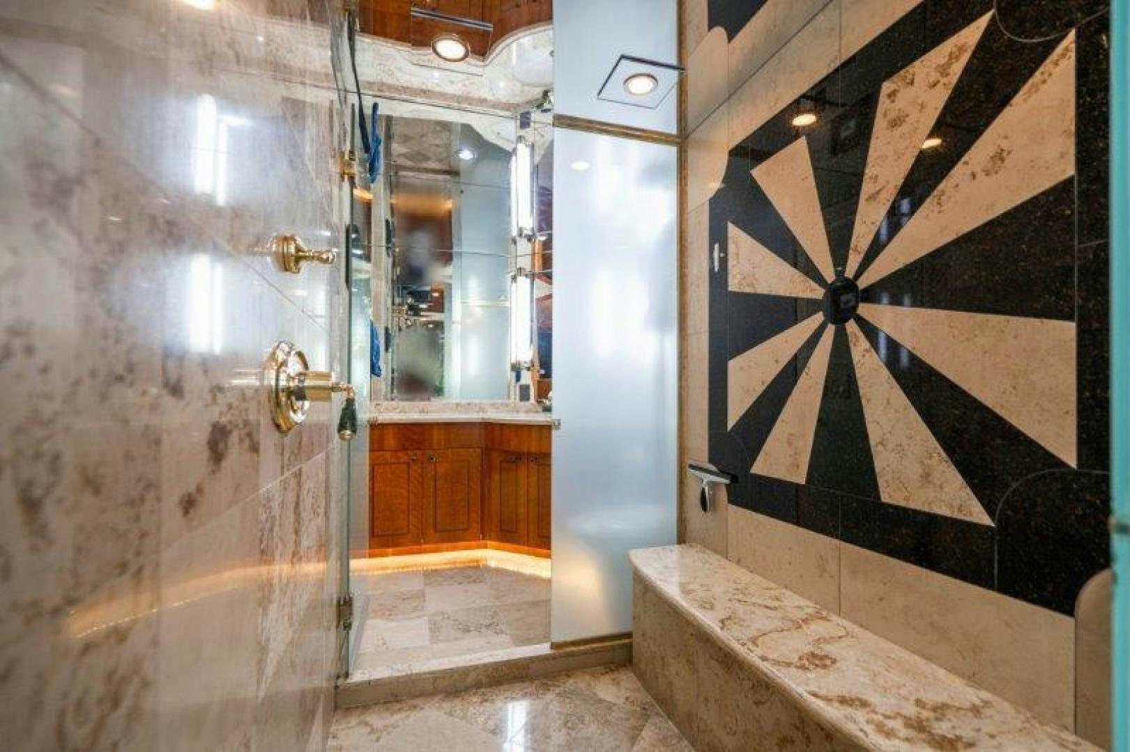 a bathroom with a marble shower aboard TIE BREAKER Yacht for Sale
