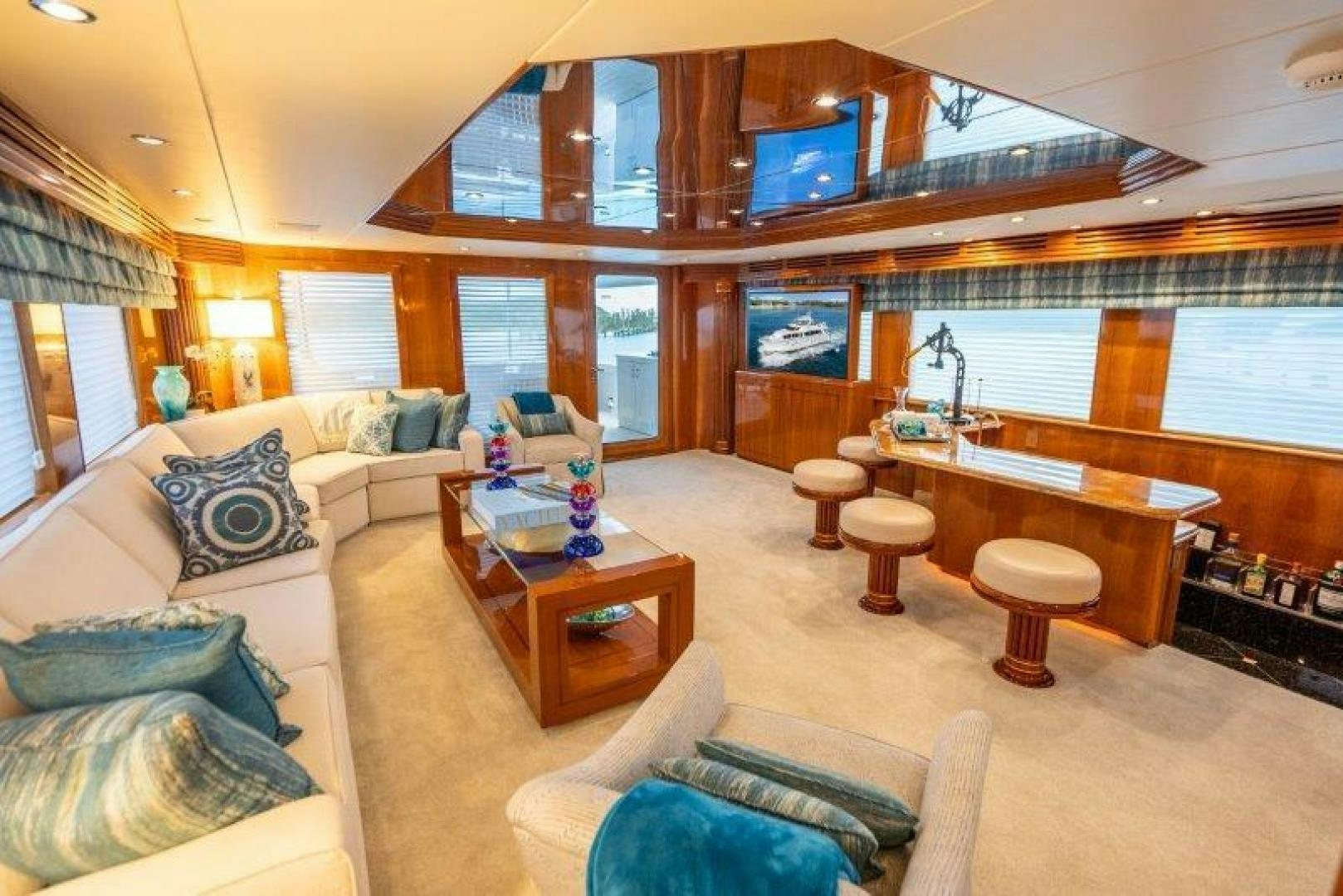 a living room with a large window aboard TIE BREAKER Yacht for Sale