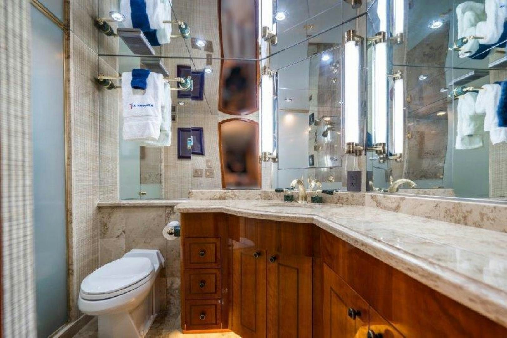a bathroom with a sink and toilet aboard TIE BREAKER Yacht for Sale
