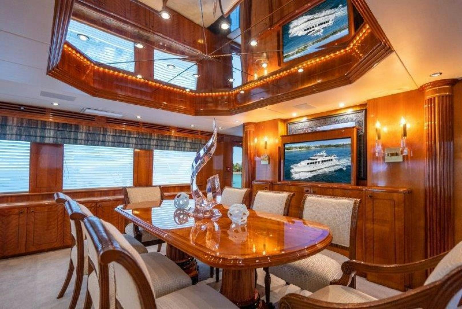 a dining room with a table aboard TIE BREAKER Yacht for Sale