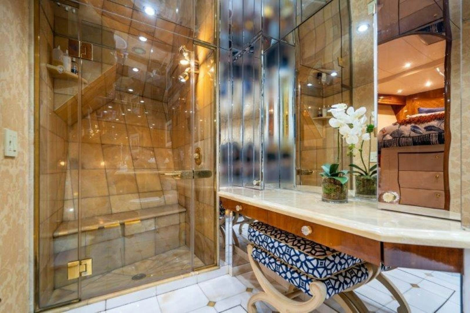 a bathroom with a large mirror aboard TIE BREAKER Yacht for Sale