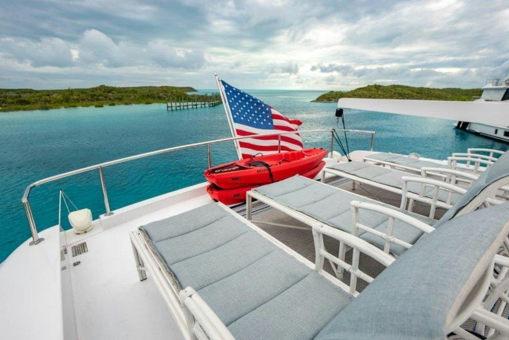 a boat with a flag on it aboard TIE BREAKER Yacht for Sale