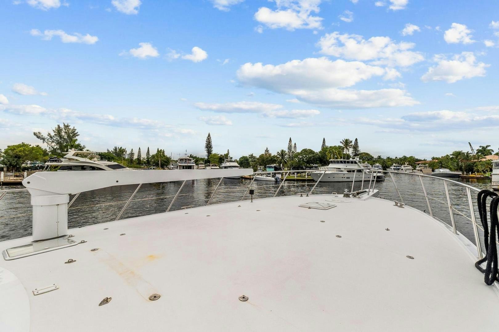 a white bridge over a body of water aboard BELLISSIMA Yacht for Sale