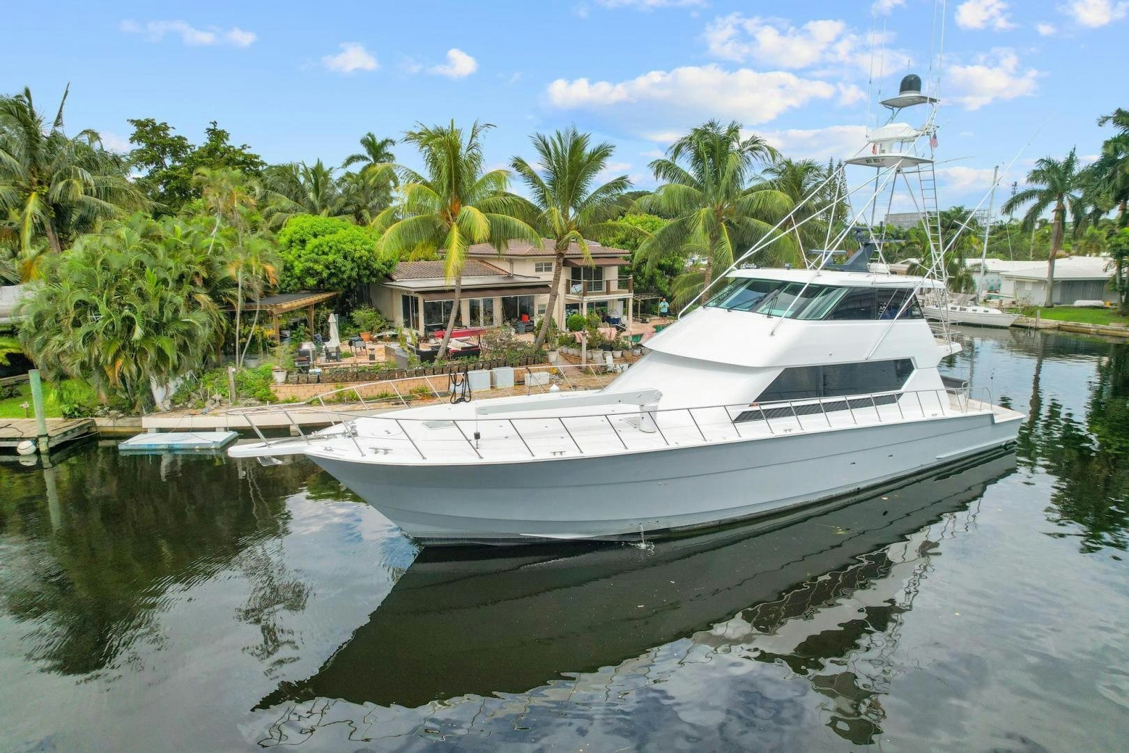 a boat docked at a pier aboard BELLISSIMA Yacht for Sale