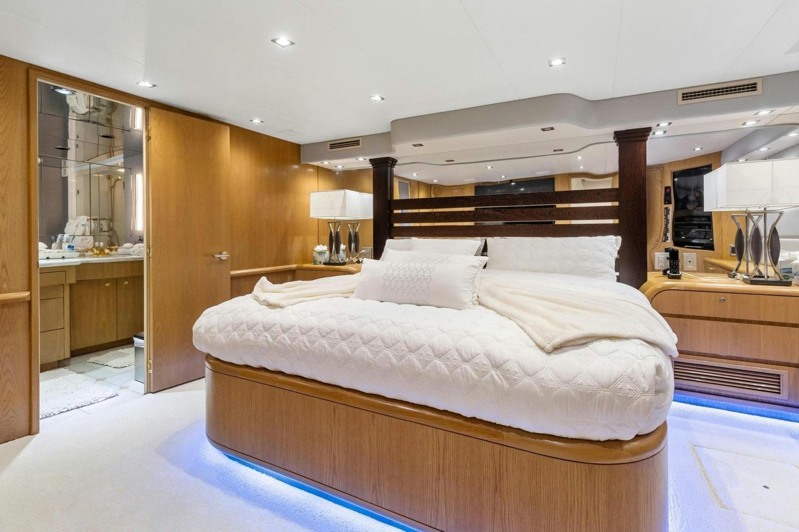 a large bed in a room aboard BELLISSIMA Yacht for Sale