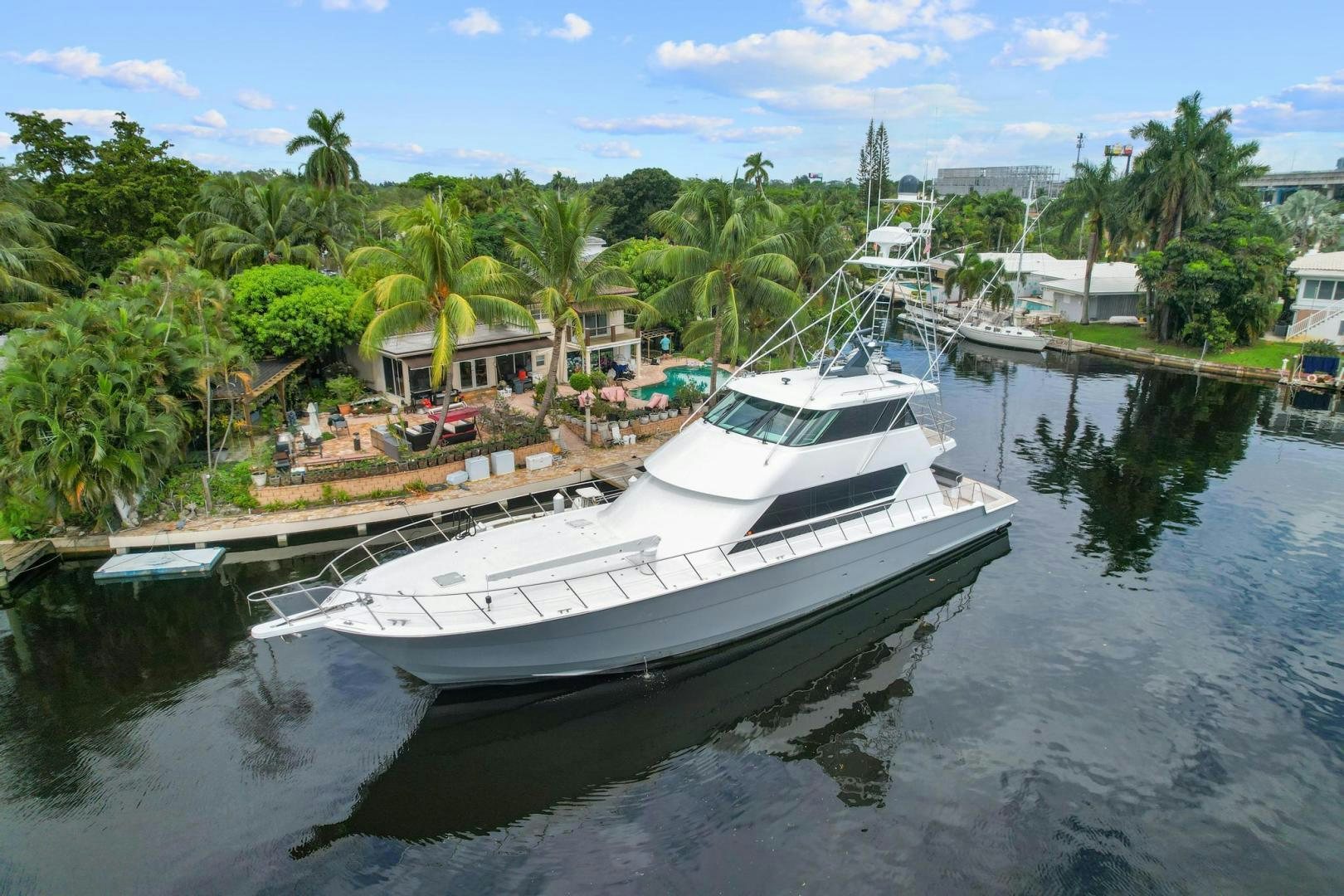 a boat docked at a pier aboard BELLISSIMA Yacht for Sale
