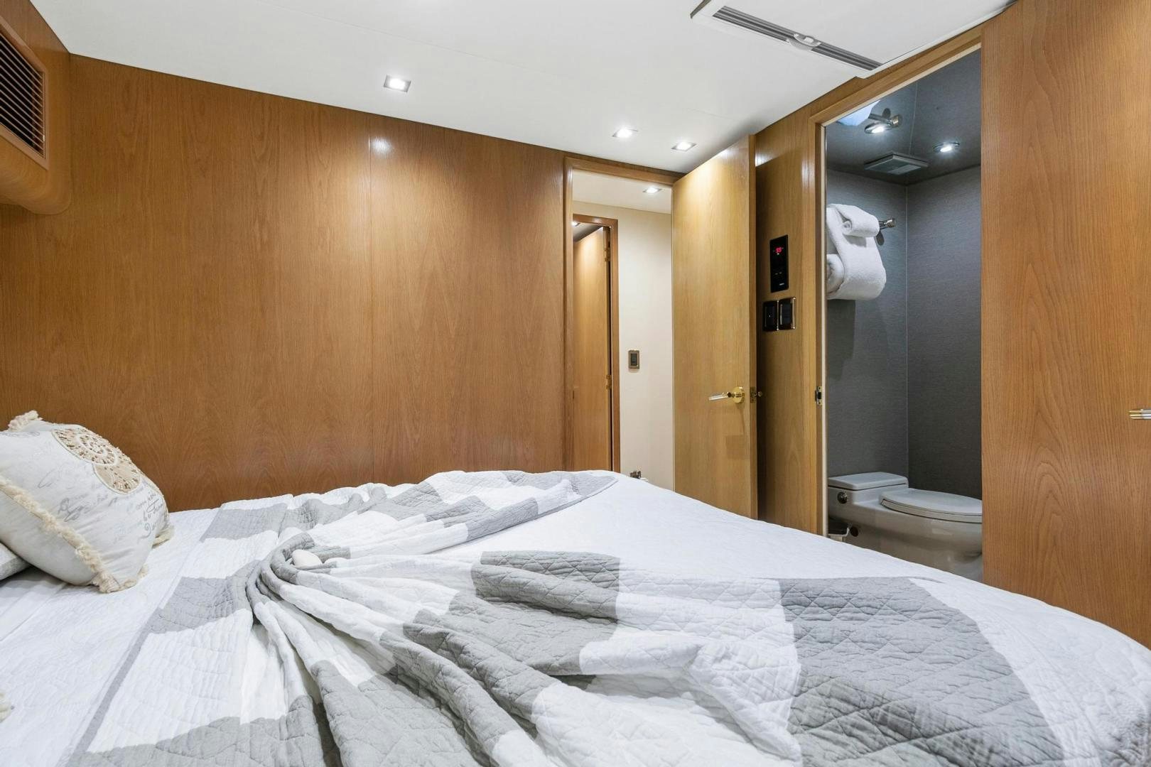 a bed with a white sheet aboard BELLISSIMA Yacht for Sale