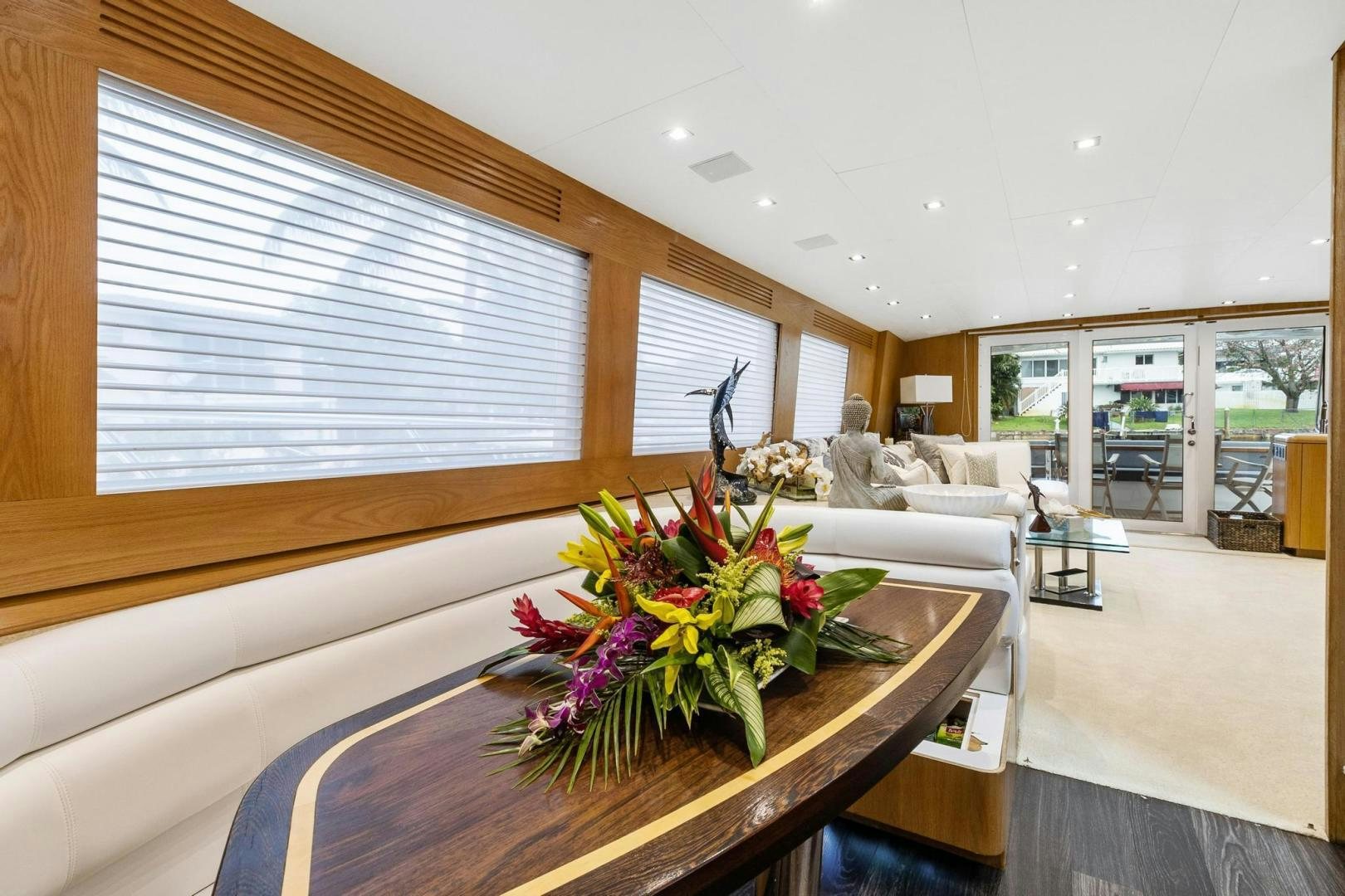 a living room with a large window aboard BELLISSIMA Yacht for Sale