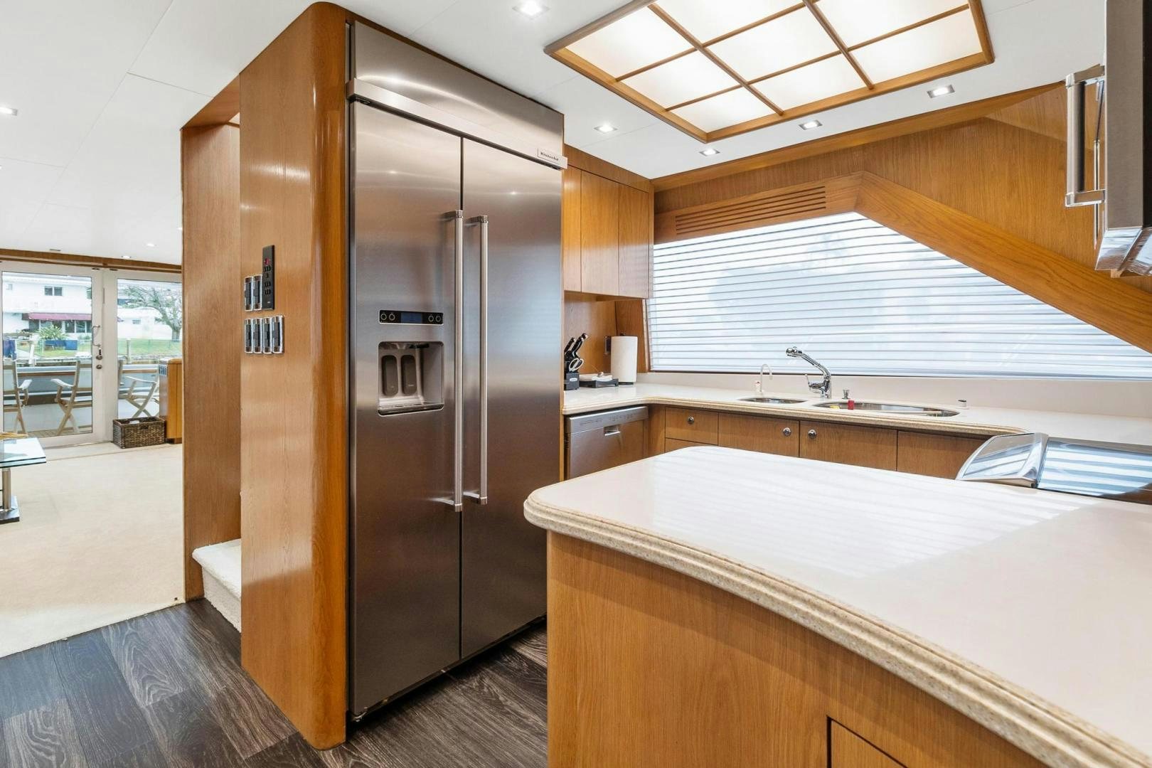 a kitchen with a large refrigerator aboard BELLISSIMA Yacht for Sale