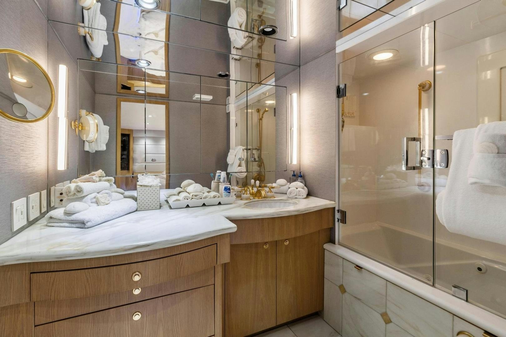 a bathroom with a large mirror aboard BELLISSIMA Yacht for Sale