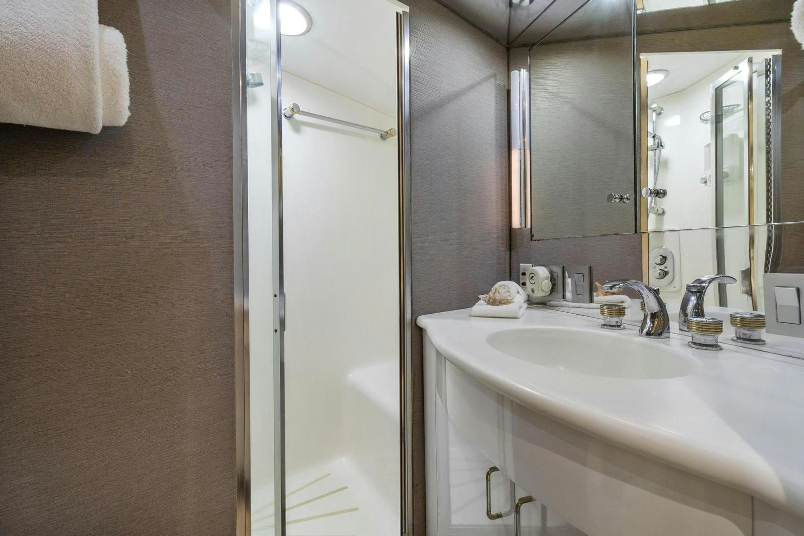 a bathroom with a sink and a shower aboard BELLISSIMA Yacht for Sale