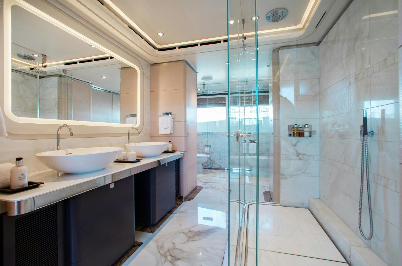 a bathroom with a shower aboard LADY L Yacht for Charter