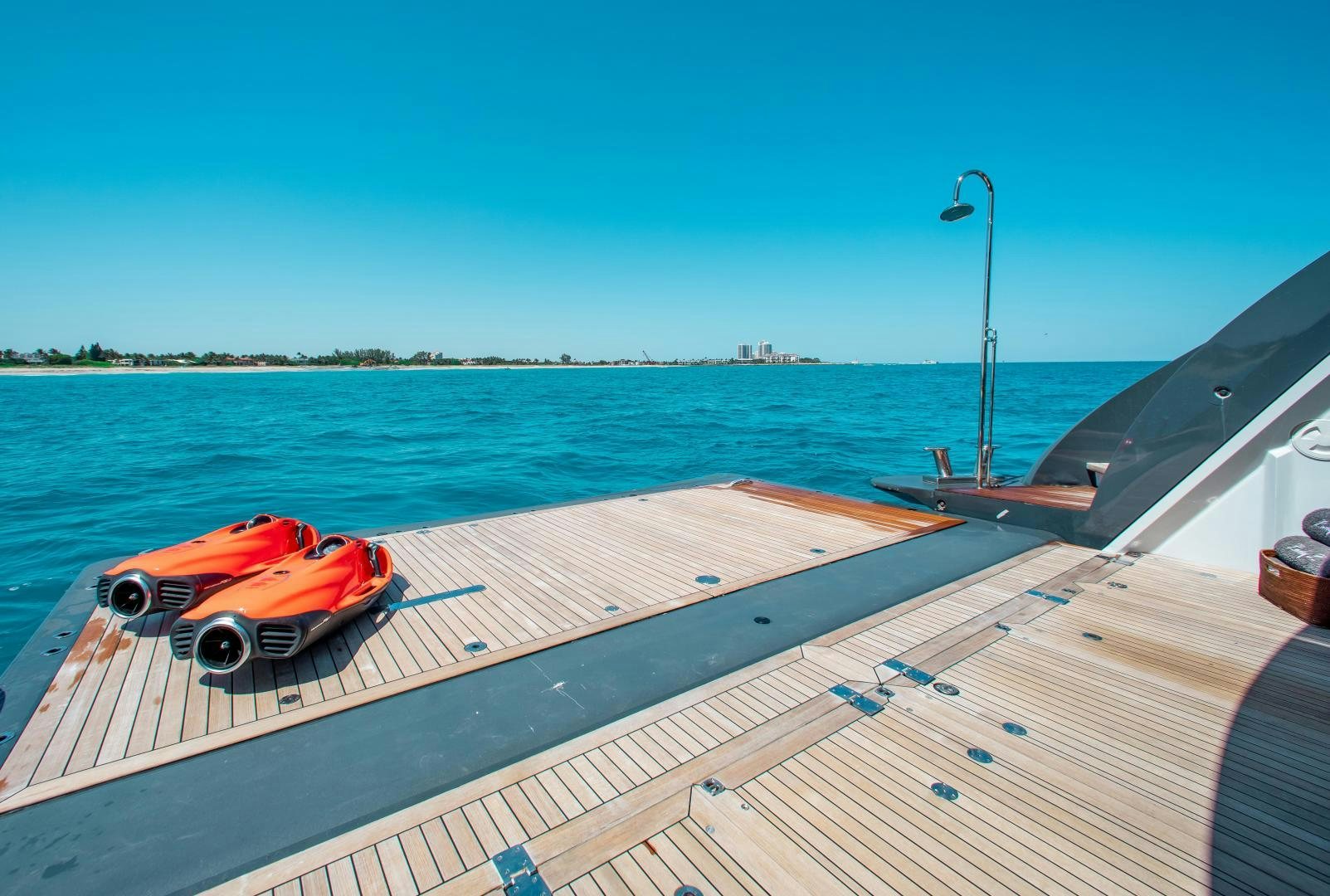 a car on a deck aboard LADY L Yacht for Charter