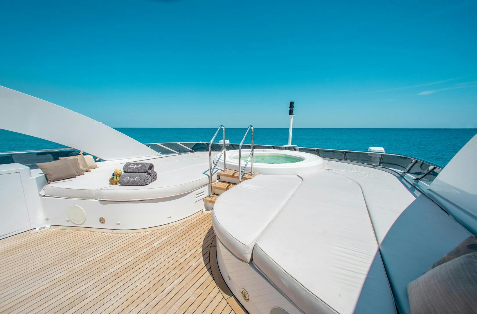 a boat on a deck aboard LADY L Yacht for Charter