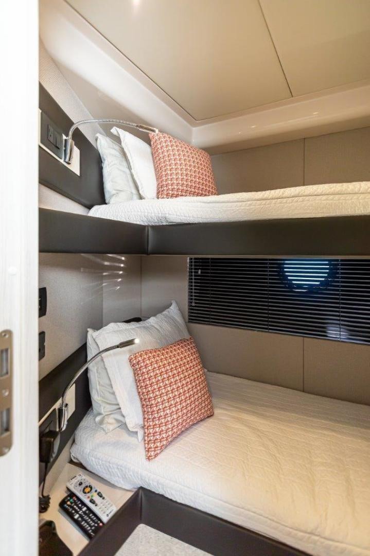 a bed with pillows aboard BLESSED Yacht for Sale
