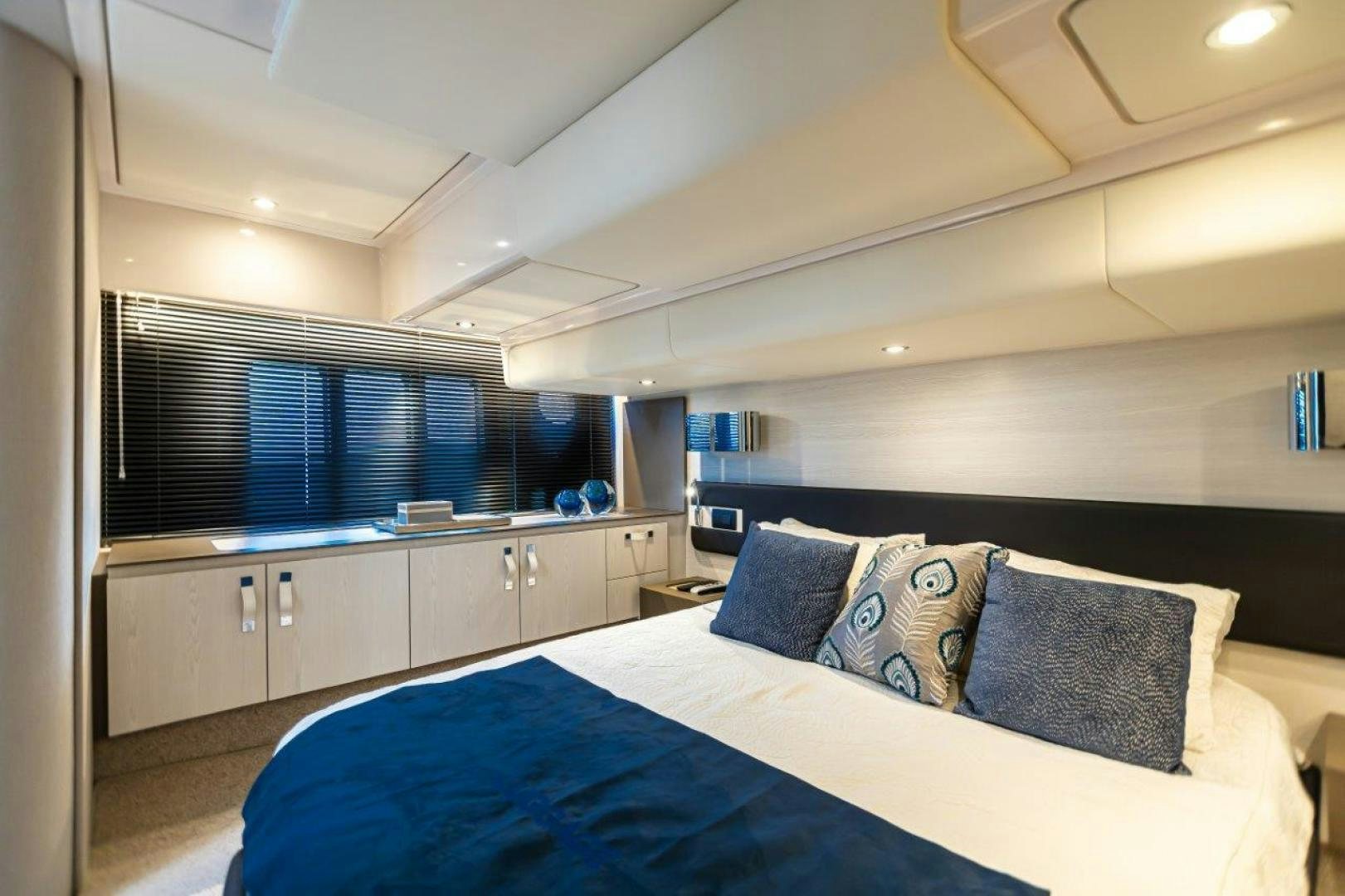a bed in a room aboard BLESSED Yacht for Sale