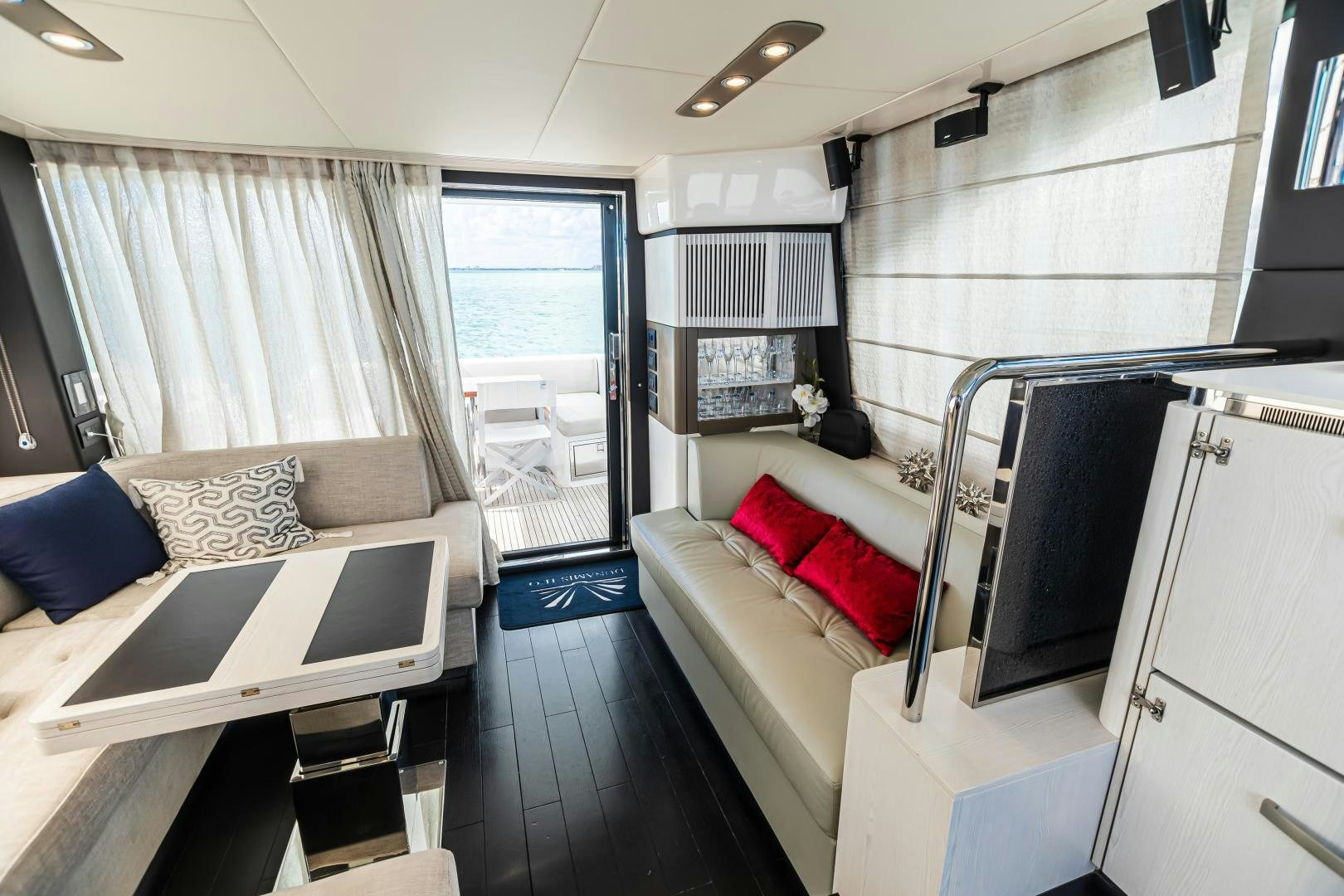 a room with a bed and a desk aboard BLESSED Yacht for Sale