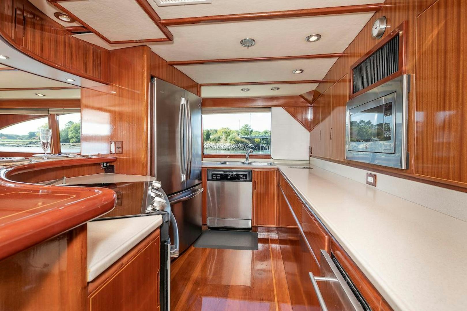a kitchen with a large island aboard ADVENTURER Yacht for Sale
