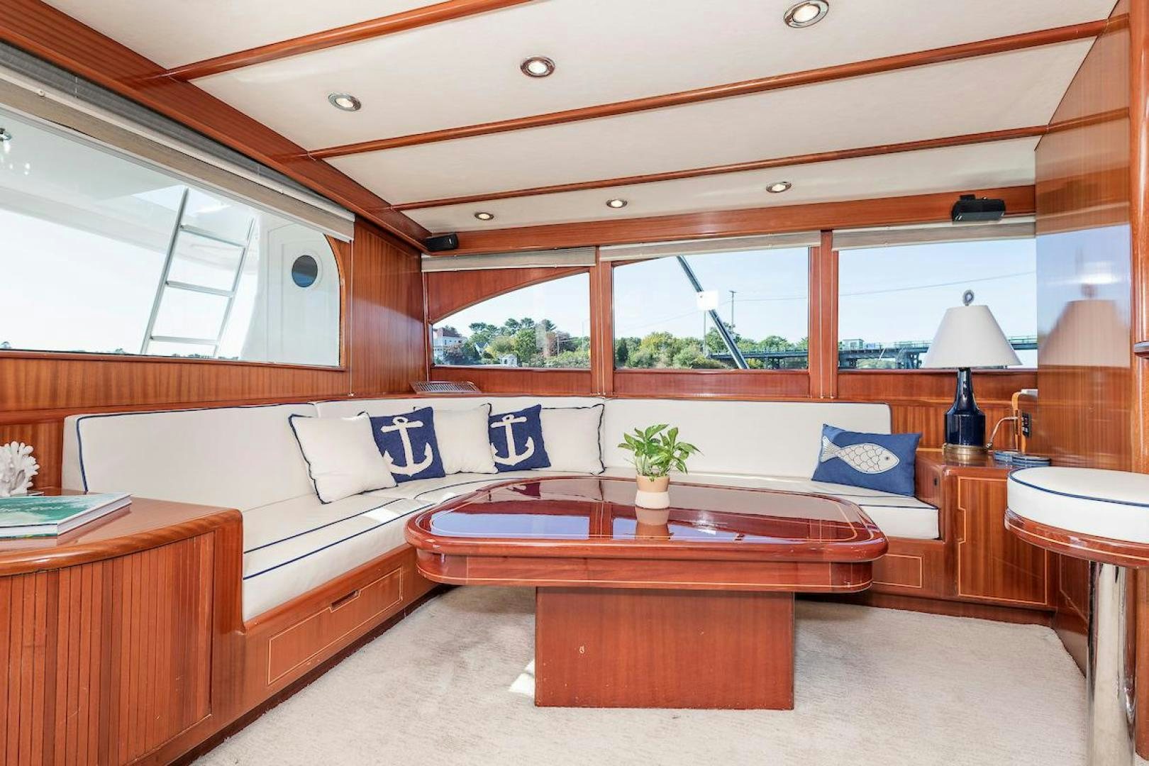 a room with a bed and a table aboard ADVENTURER Yacht for Sale