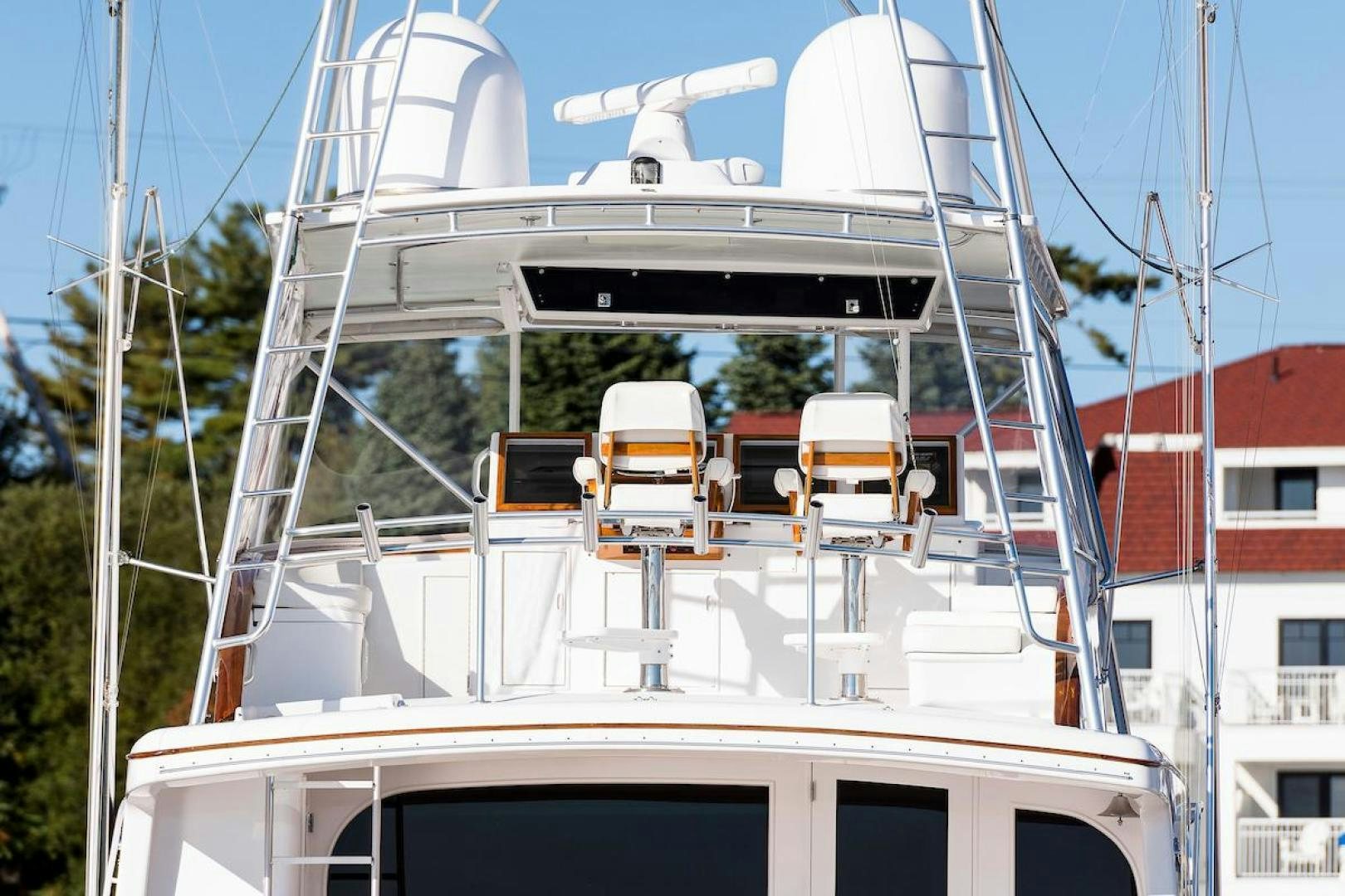 a white ferris wheel with chairs aboard ADVENTURER Yacht for Sale