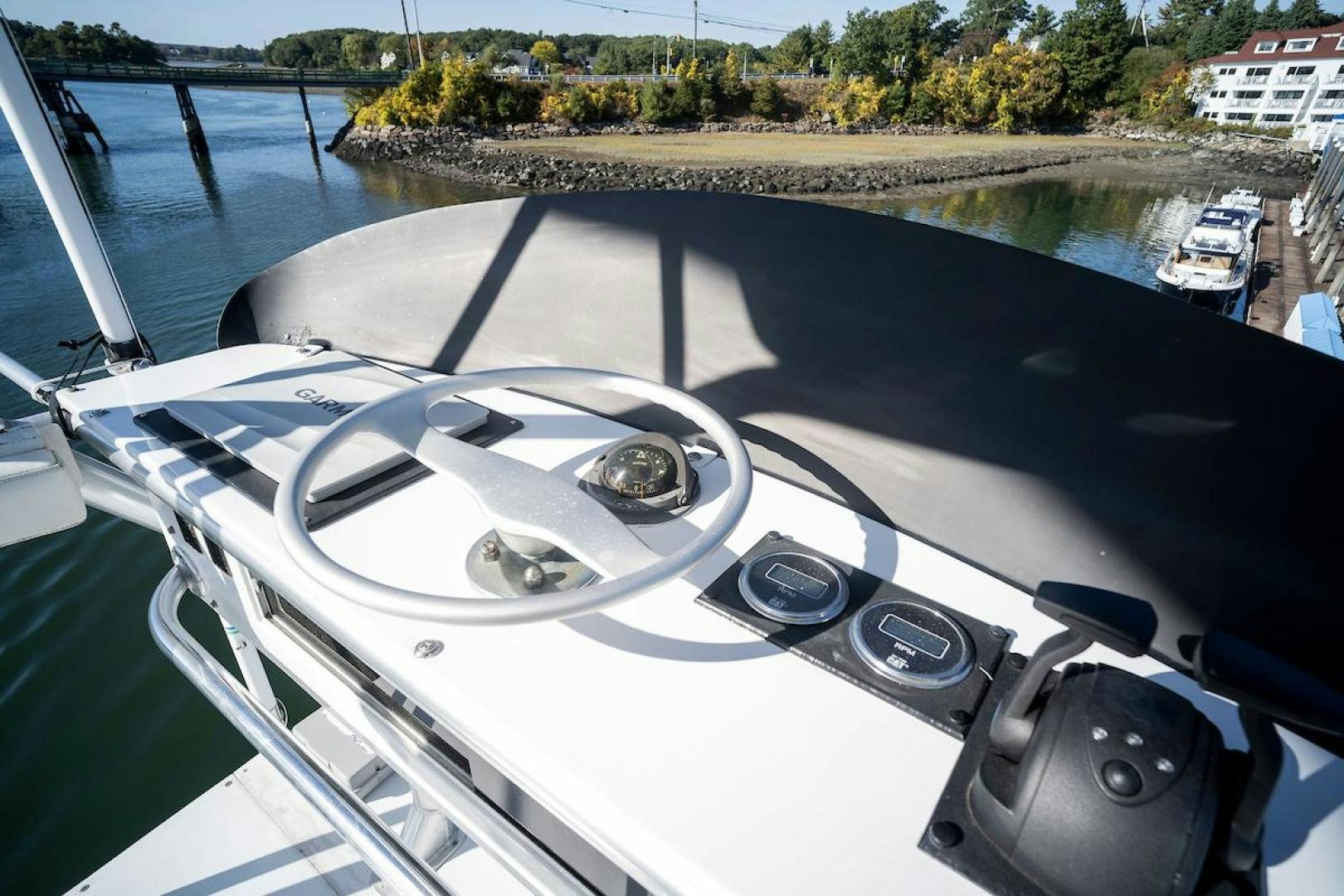 the steering wheel of a car aboard ADVENTURER Yacht for Sale