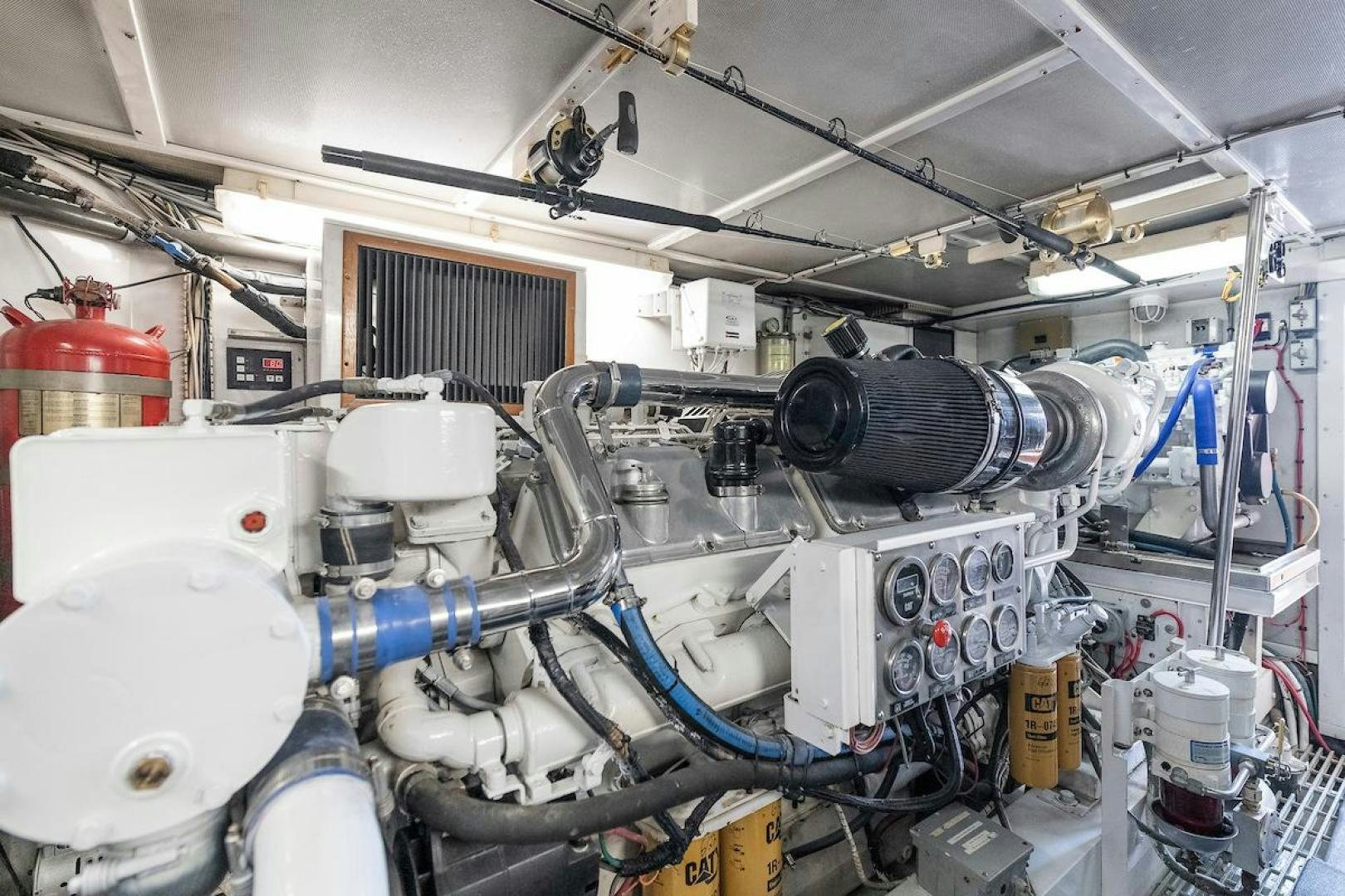 a room with several pipes and machinery aboard ADVENTURER Yacht for Sale