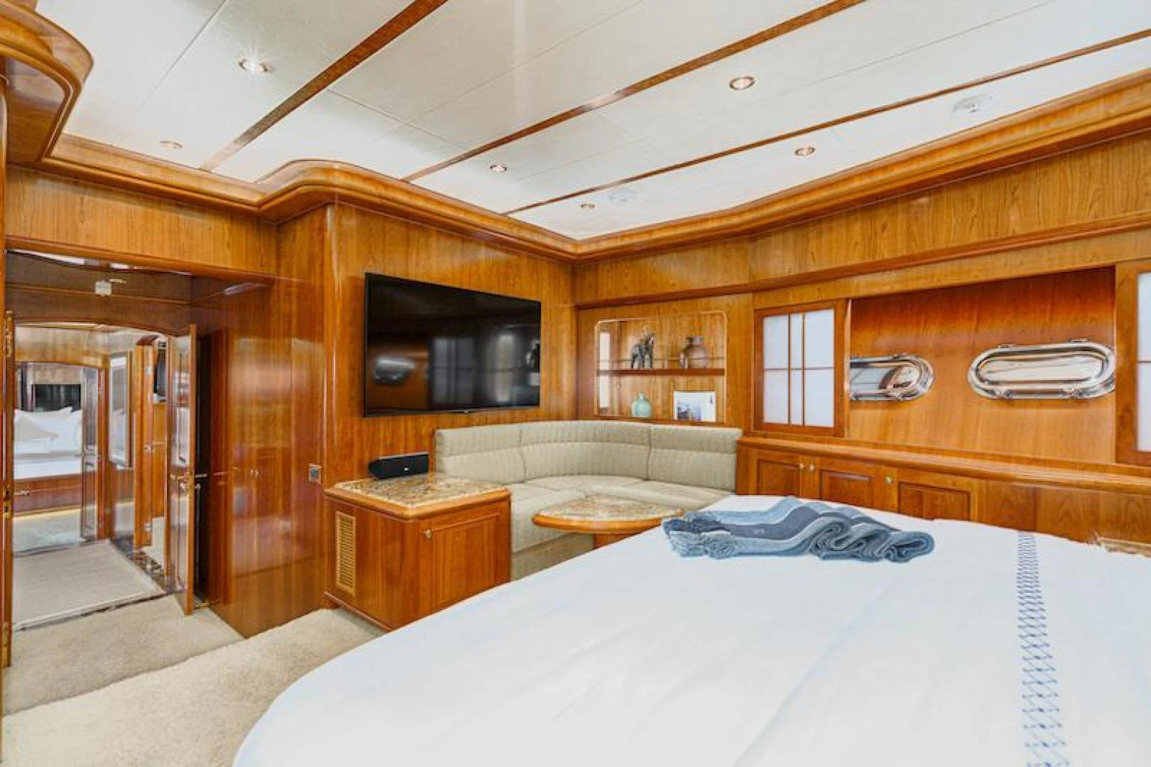 a room with a bed and a tv aboard ALMOST THERE Yacht for Sale